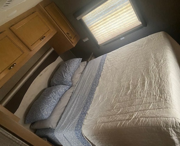 Master Bedroom.  Memory foam "queen" bed.  It has a separate tv for streaming.  Closet and drawers make it homier than living out of a suitcase.  . Thor A.C.E. 2017