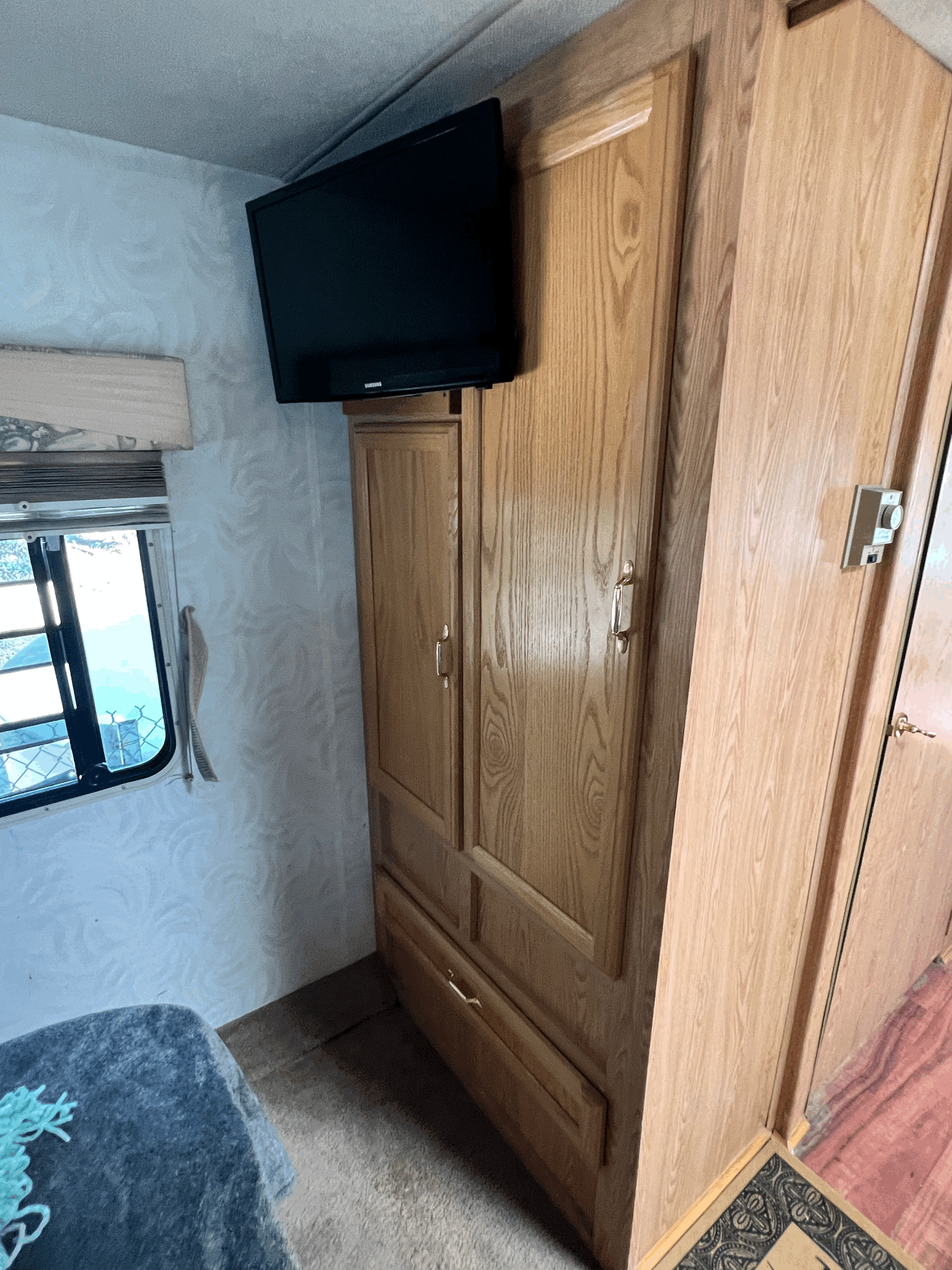 There is a TV in the bedroom. It is currently not hooked up to anything but I plan on getting an antenna. . Georgie Boy 34 1999