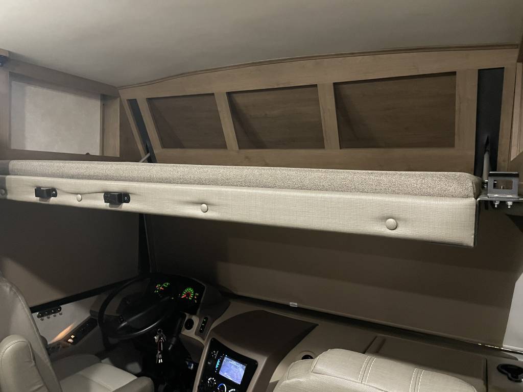 RV rental interior showing a comfortable cab-over bunk bed above the driver's area.. FR3 FR3 Motorhome 2020