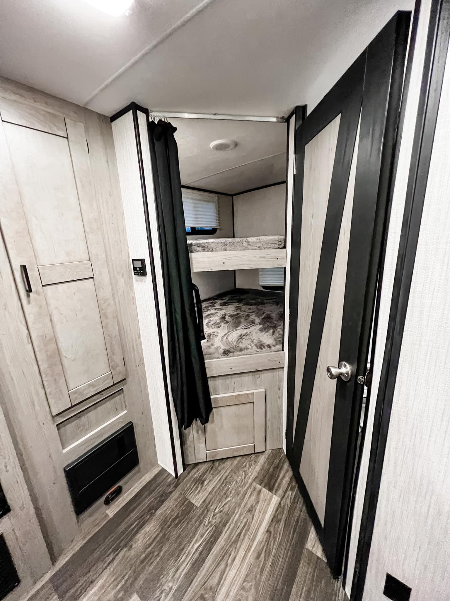 Bunks and pantry. Heartland RVs Mallard 2021