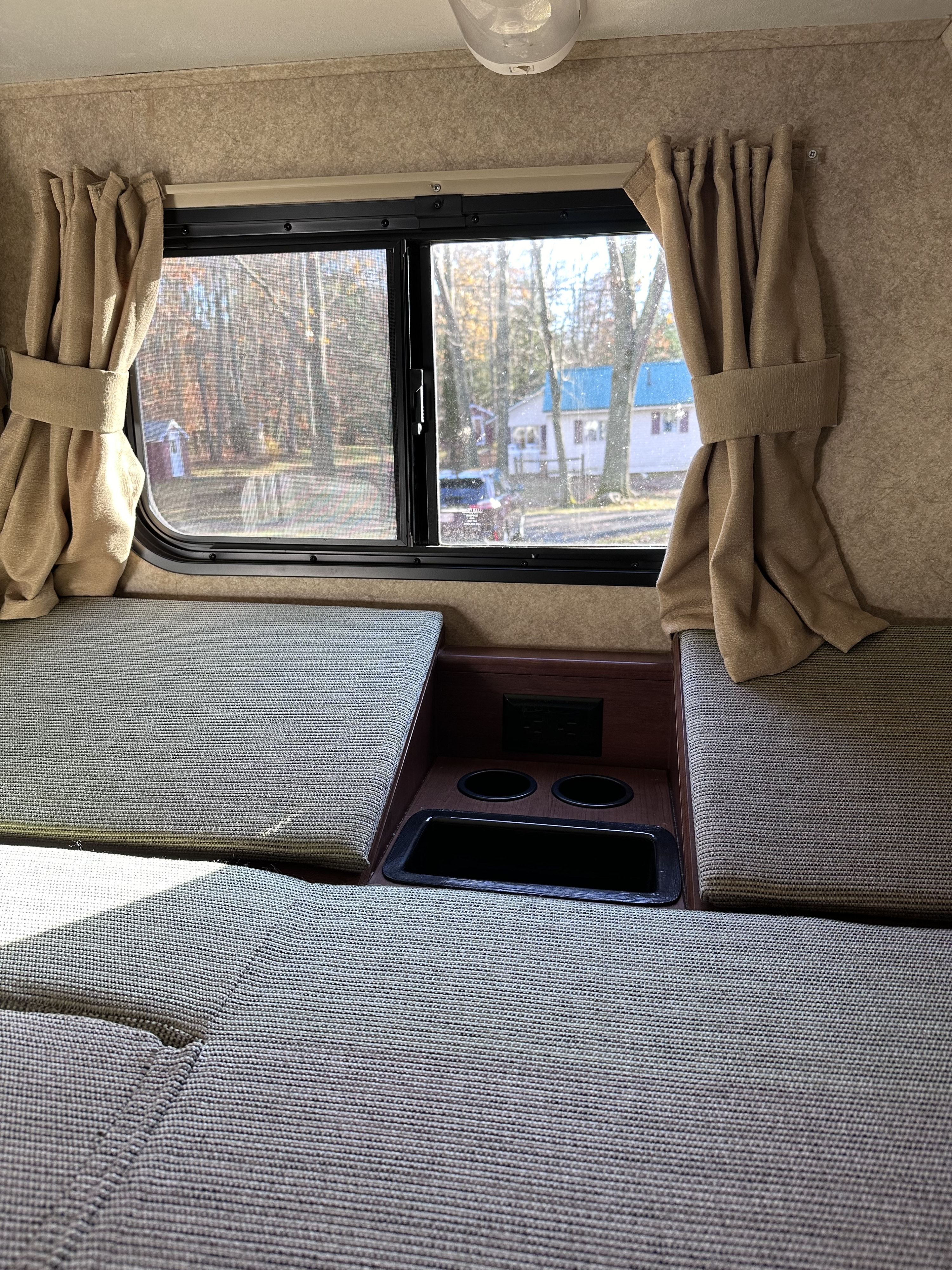 Bunk area has outlets, storage, and is very cozy!. Forest River Sunseeker LE 2014
