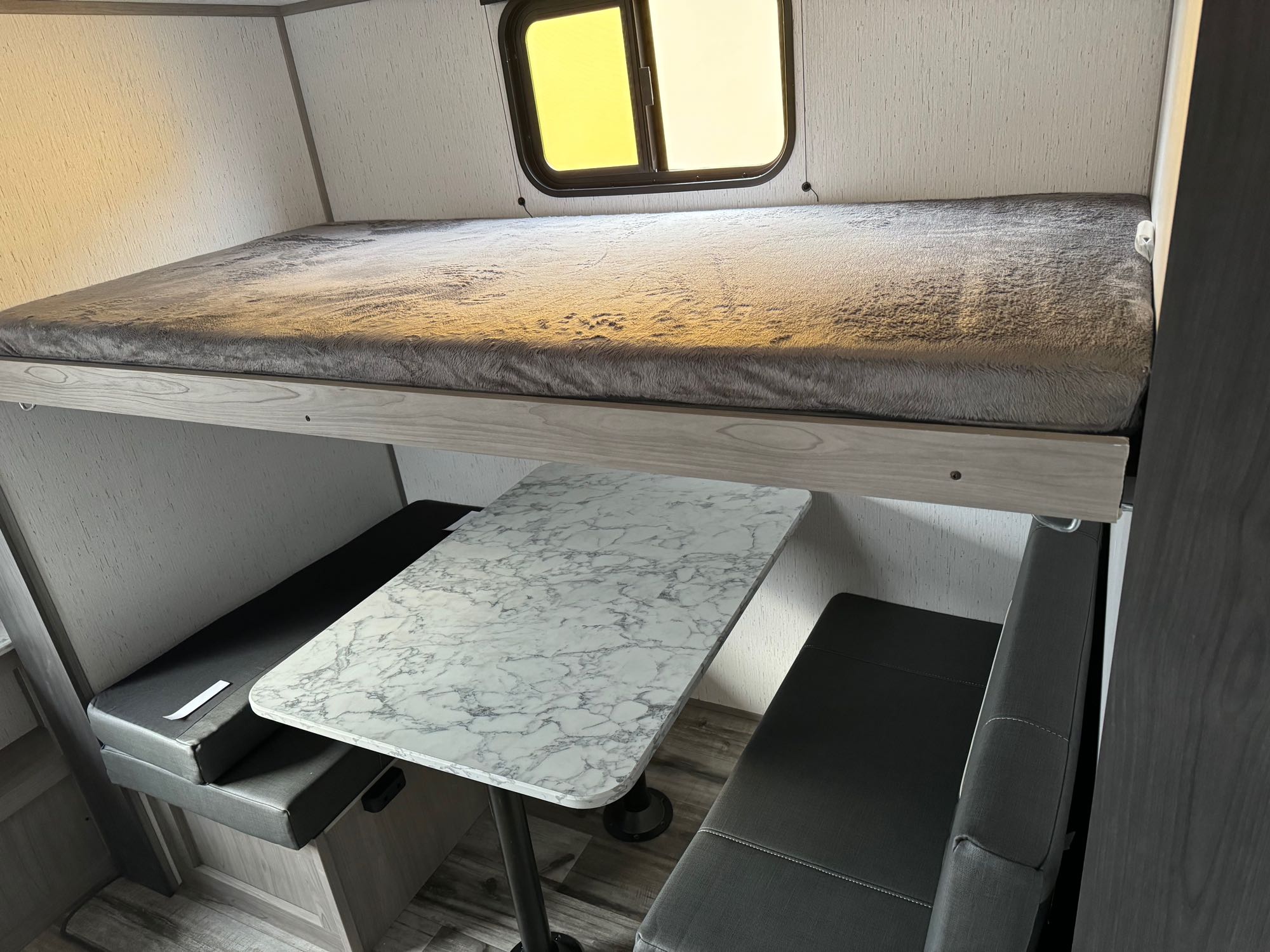 Twin bed table turns into another bed. Coleman Lantern 337BH 2023