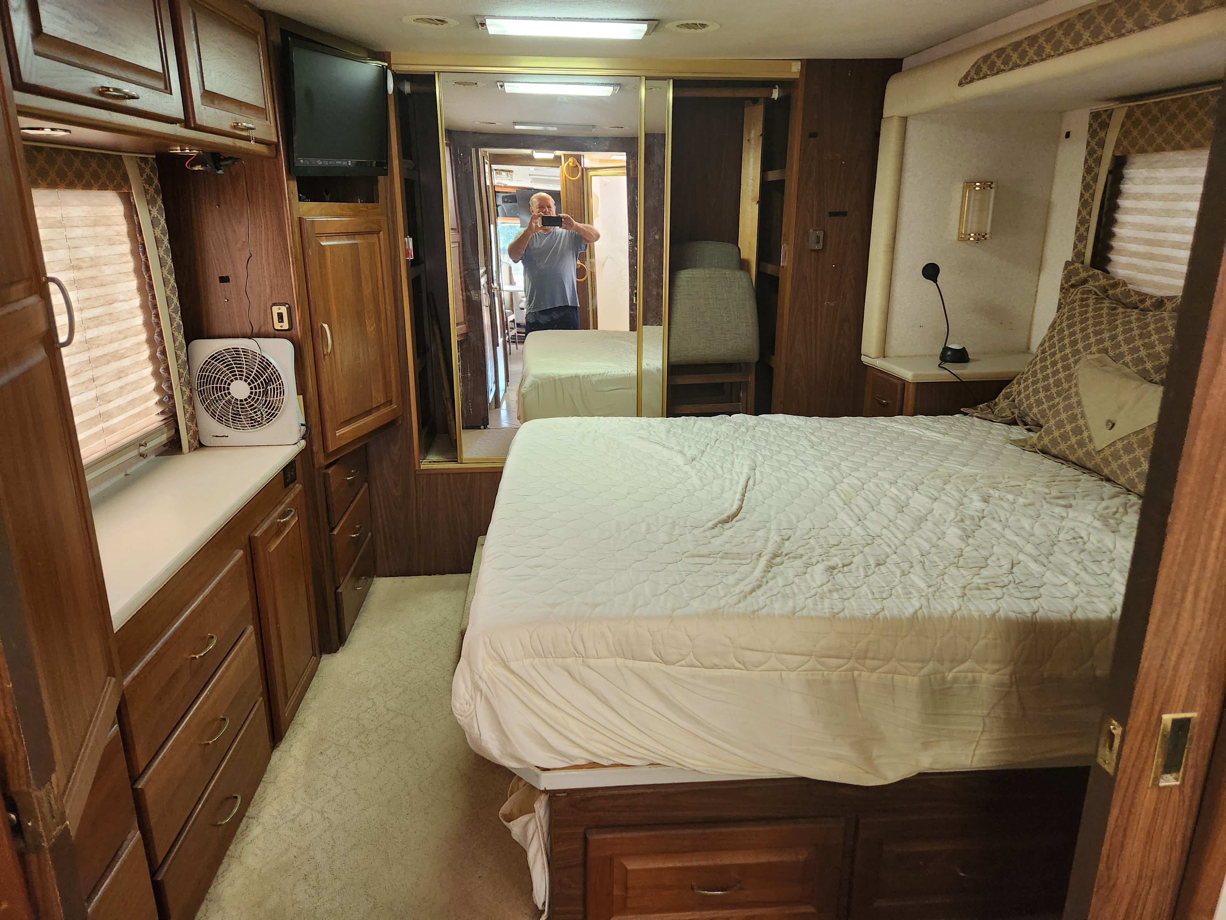 LARGE Bedroom with Ample Storage Cabinets & LARGE Wardrope Space with Sliding Doors - RV Queen Bed with Foam Mattress. National RV Tradewinds 2003