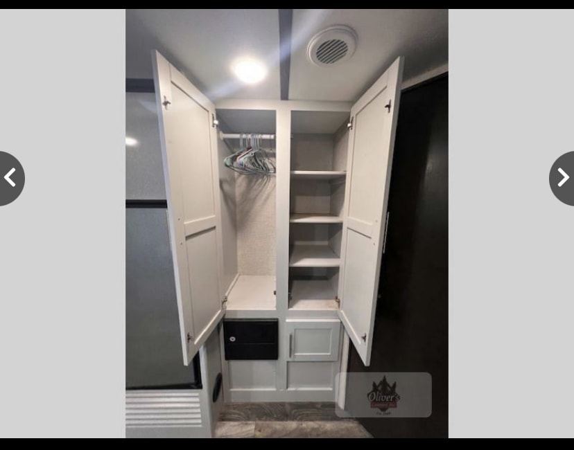 RV rental: White wardrobe with hanging rod & shelves, plus lower cabinets. Smart, compact storage for your trip.. Keystone RV Bullet Ultra Lite 2019