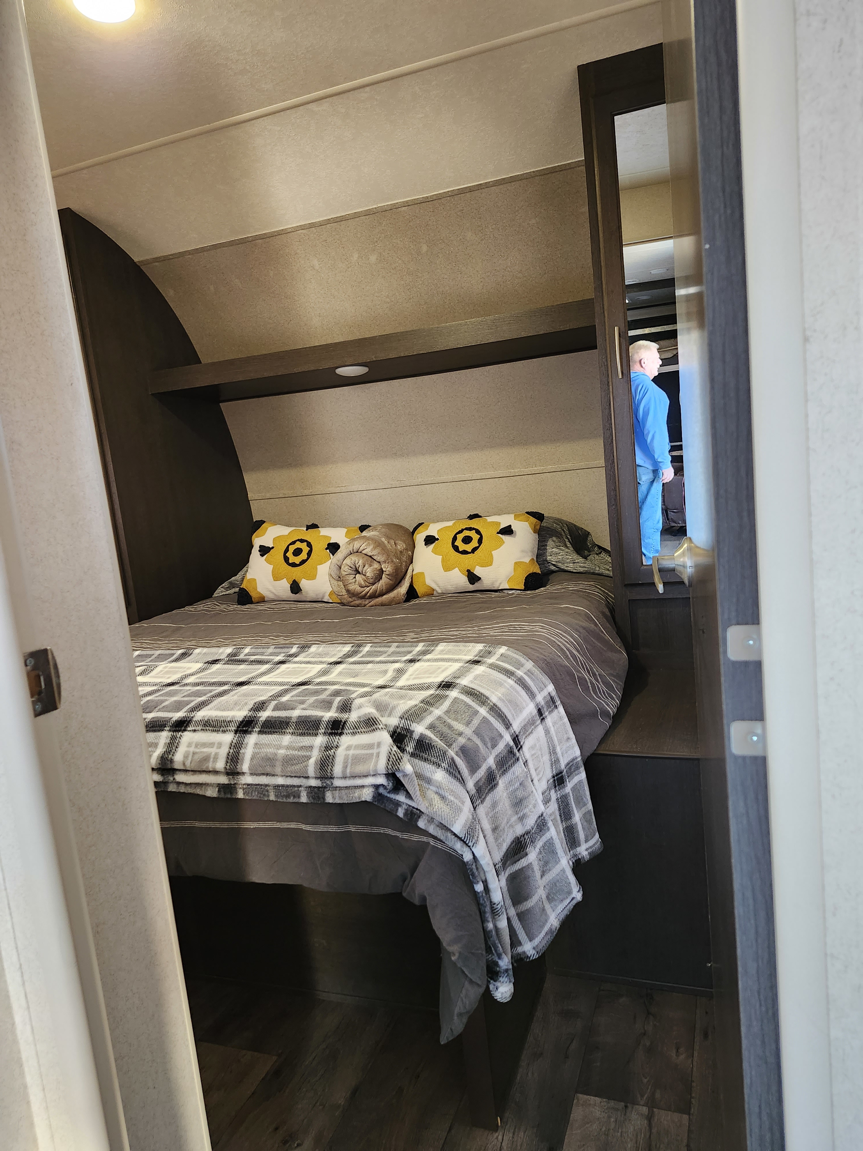 Main bedroom. Very spacious. Two small hang up closets along with overhead storage. Shockwave Deluxe Toy Hauler 2020