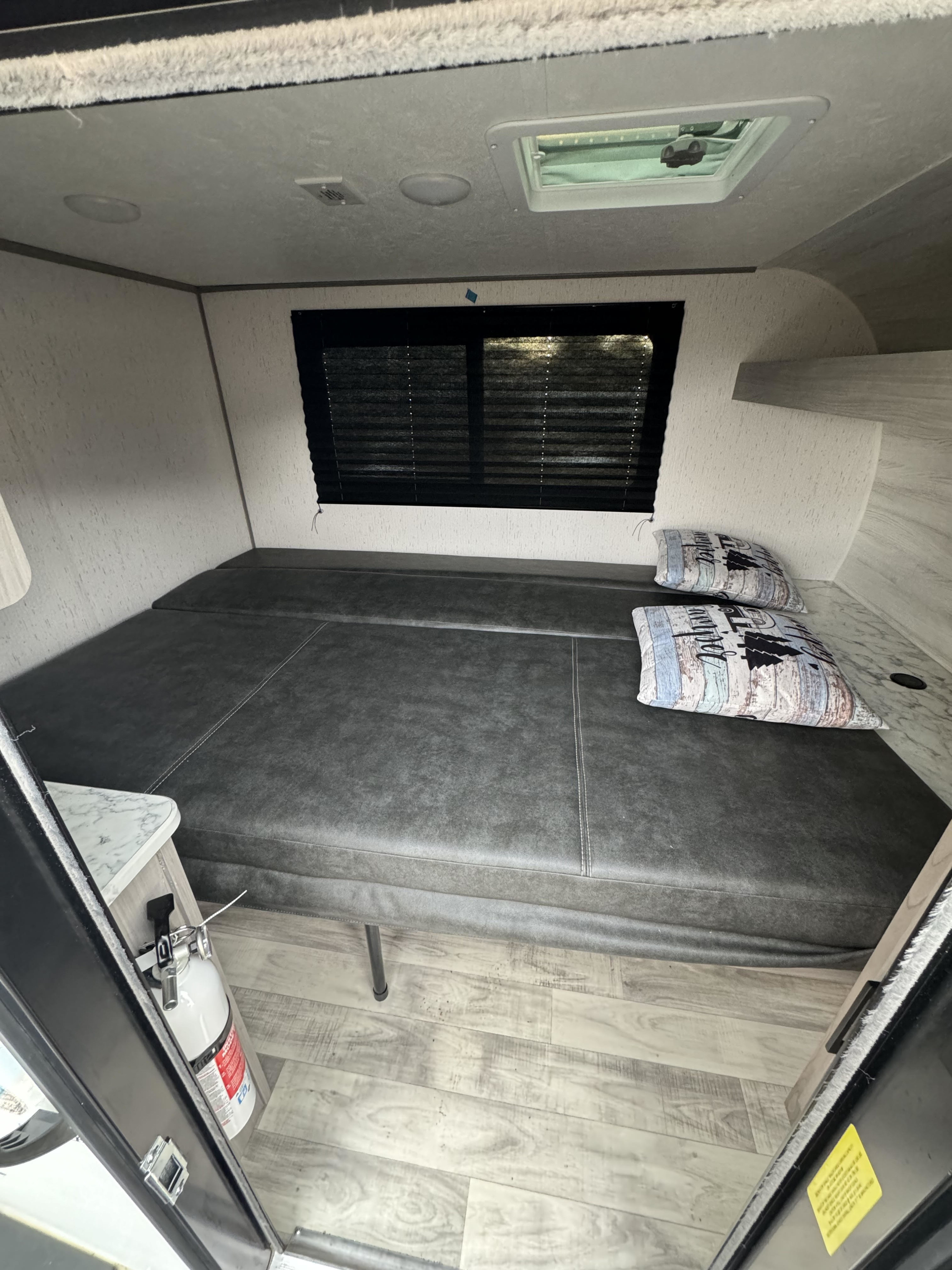 The bed is 6' 2" in length. It easily slides back into a couch to make room in the camper just in case you need to escape the rain or cold. . Coleman Rubicon 2023