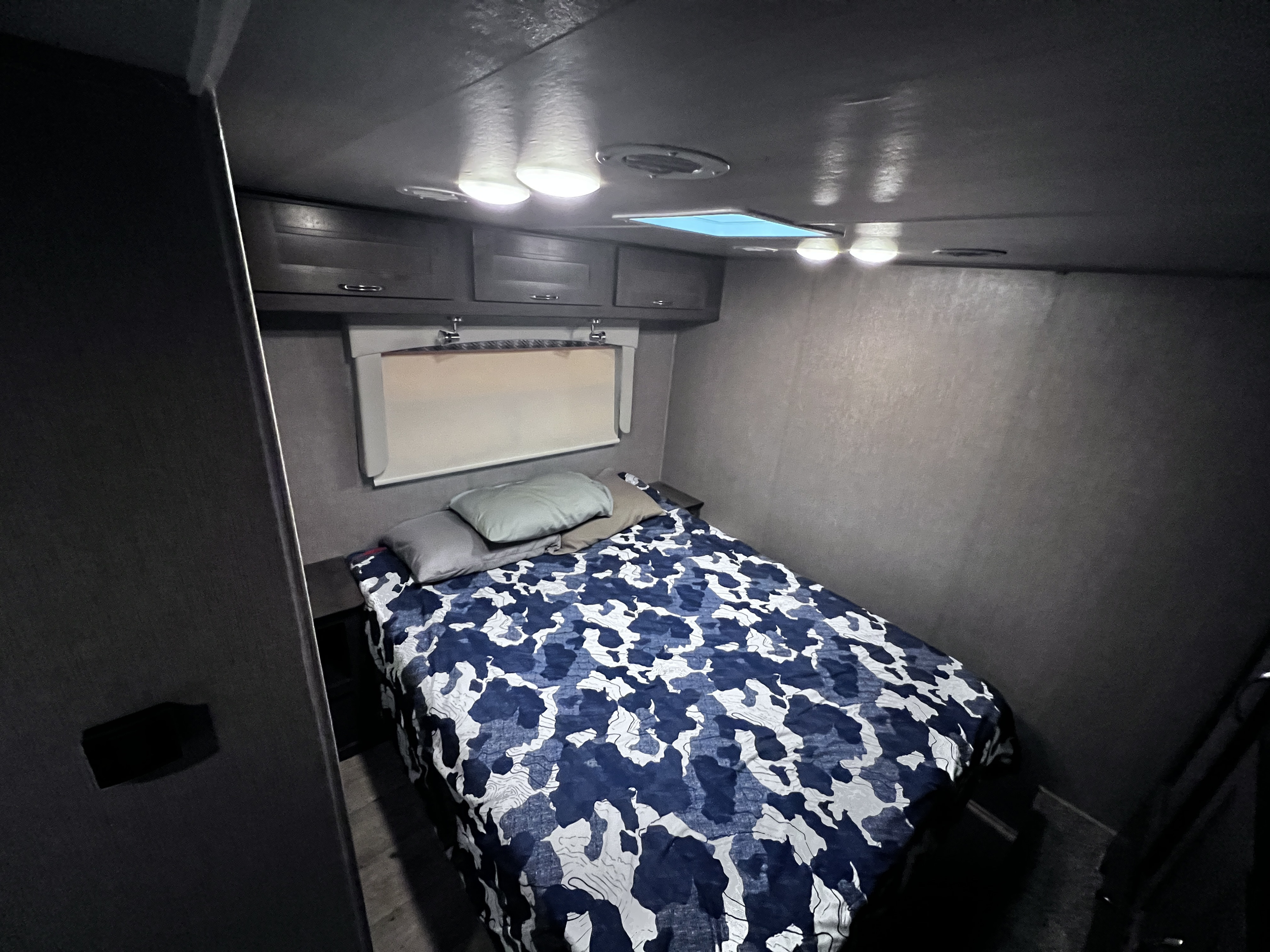Queen Bed with dual nightstands. . Nexus RV Triumph 2022