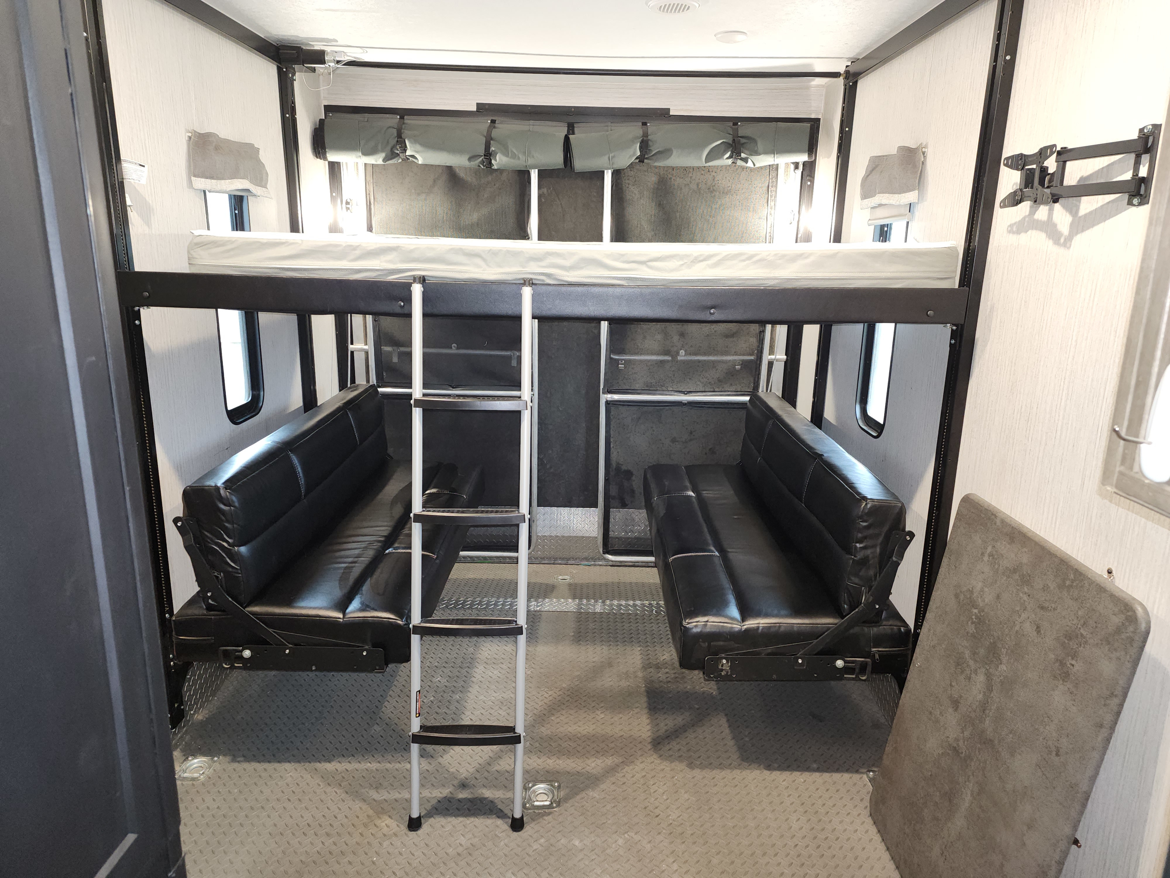 RV rental toy hauler interior.. Forest River Puma 2021