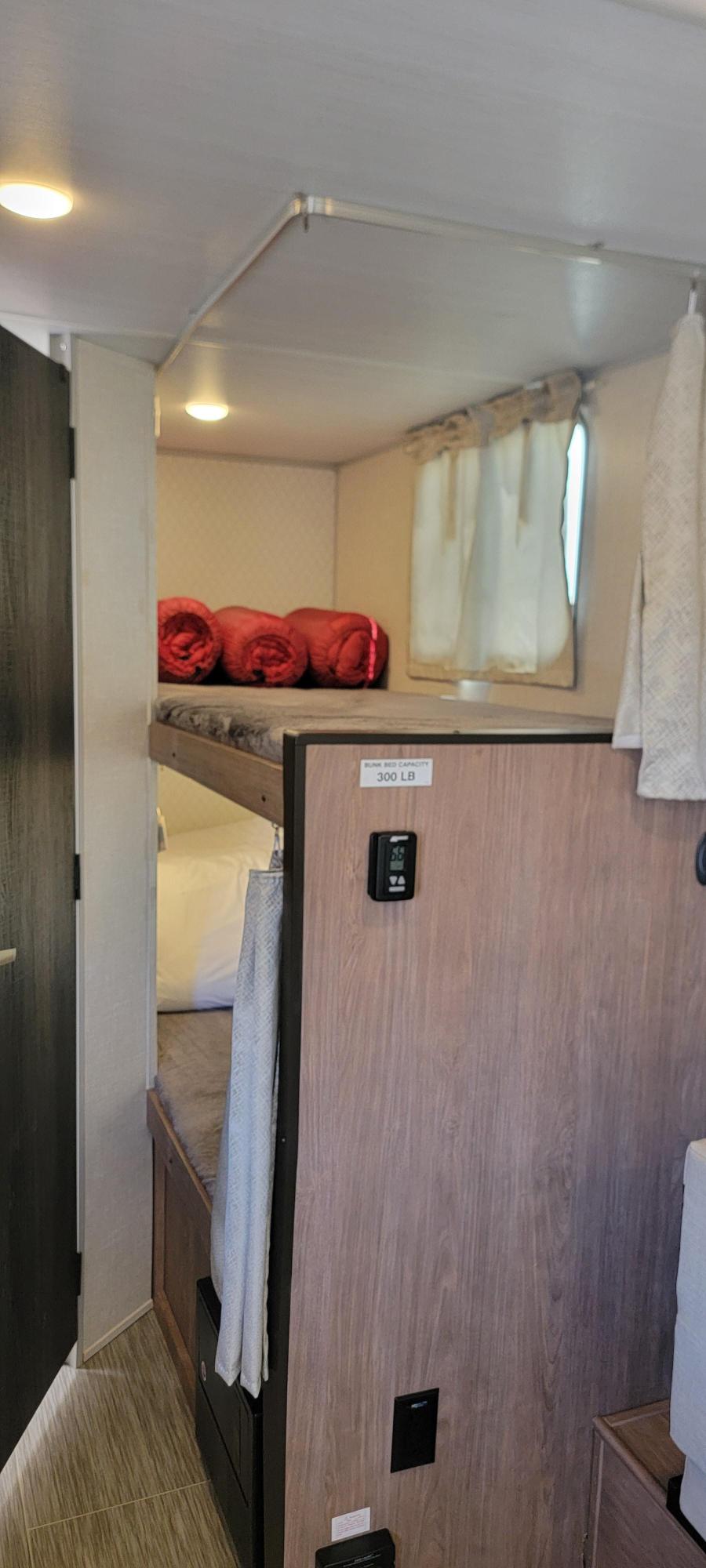 Bunkbeds with sleeping bags and pillows. . No Boundaries 19 2021