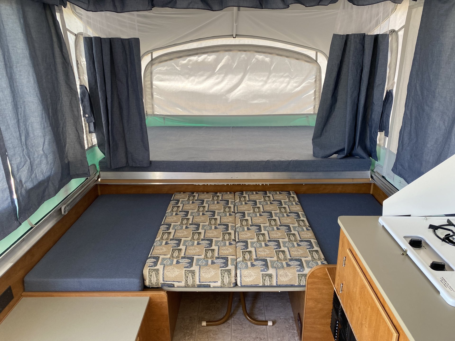 Full-size bunk and dinette convert to more sleeping area. Fleetwood Destiny 2006