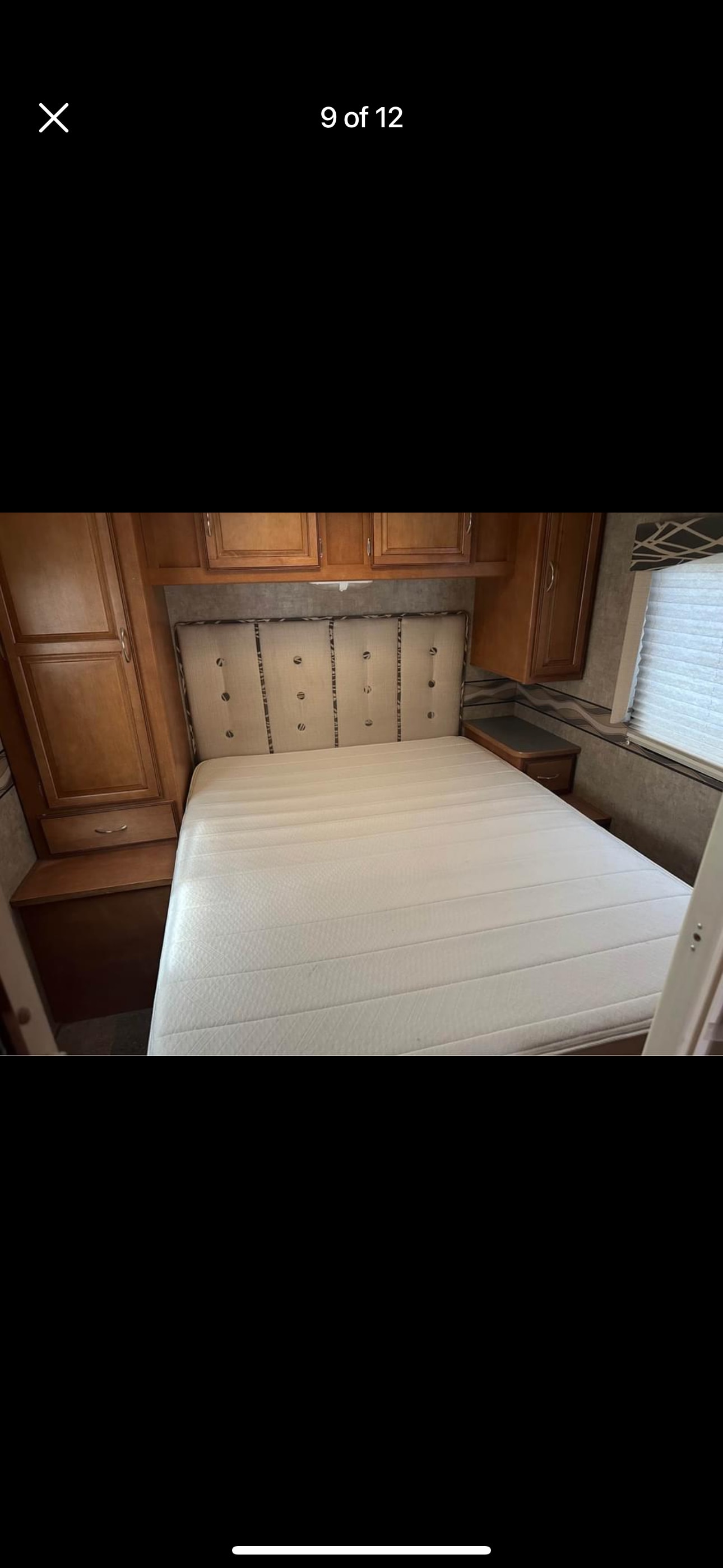 RV rental: well-appointed bedroom with a comfortable queen bed, tufted headboard, and ample wood storage.. Winnebago Minnie Winnie 2016