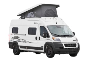 White Class B RV with a gray pop-top roof, ready for your next rv rental adventure. Perfect for camping and road trips.. Winnebago Solis 2024