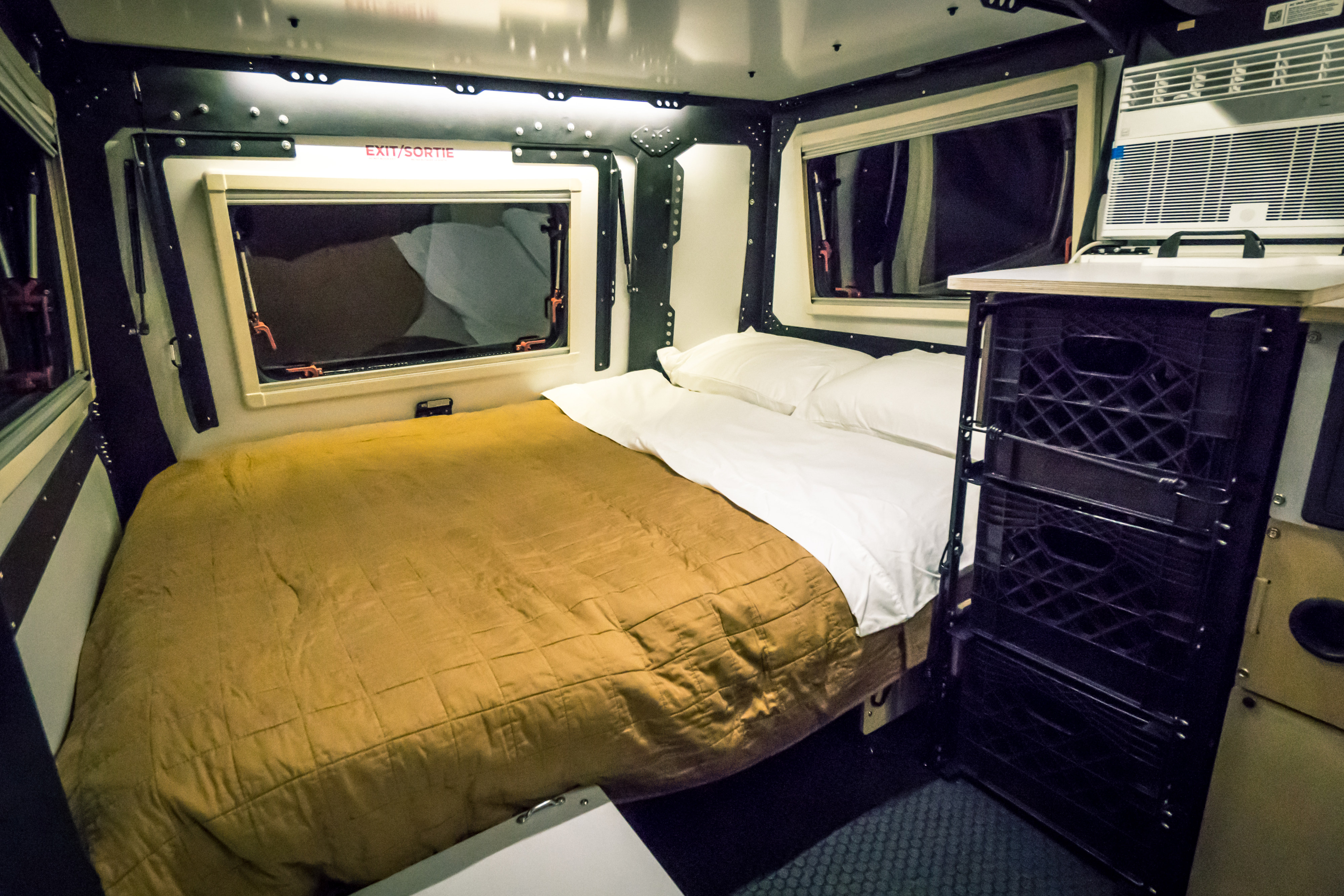 Enjoy a queen/full bed that comfortably sleeps 2 adults. Utilize the 3 stacked milk crates for clothing and organization.. TAXA Mantis 2023