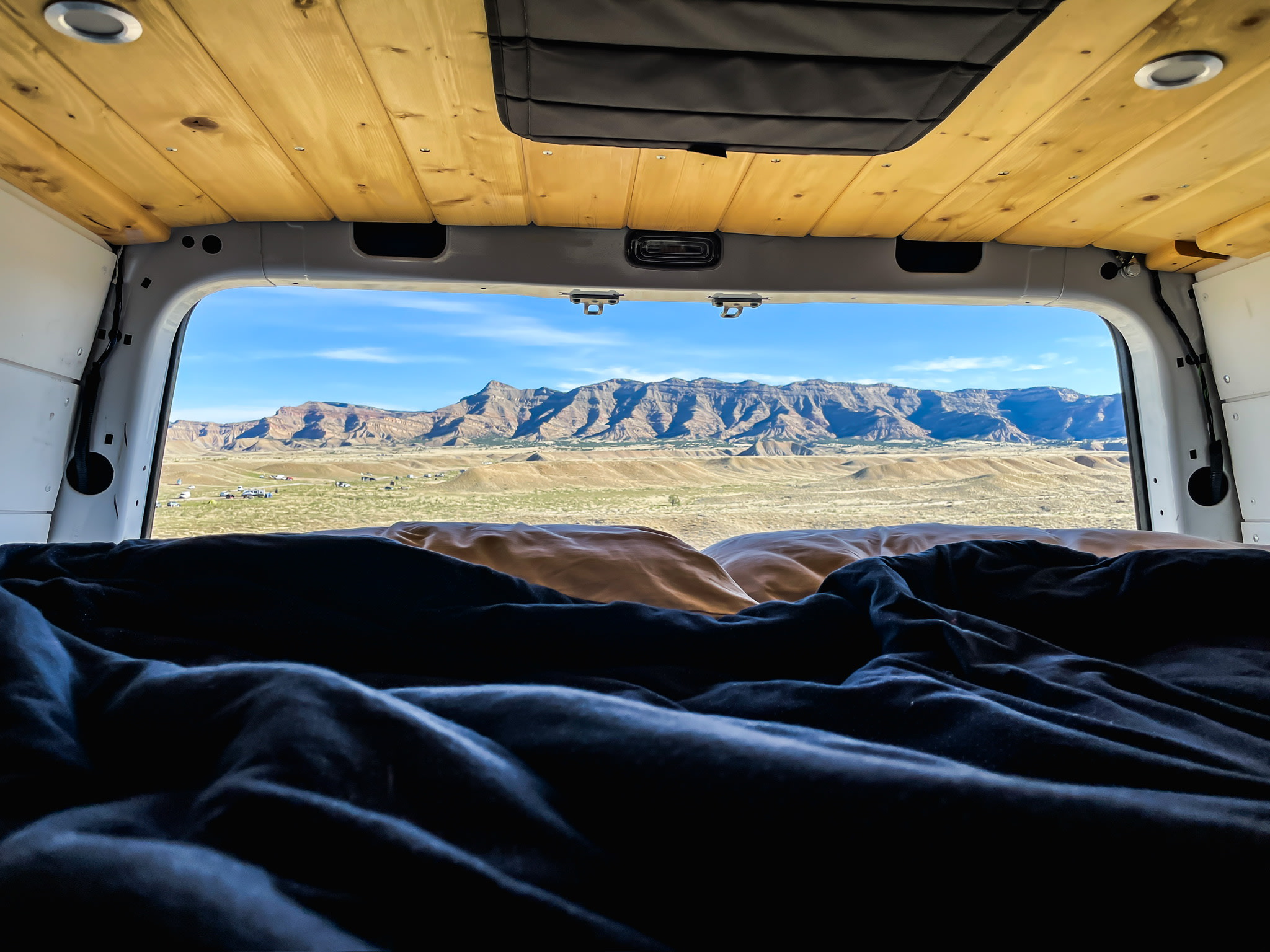 Upper sleeping area. A full sized queen and an amazing view when you open the rear doors. Mercedes-Benz Sprinter 2020