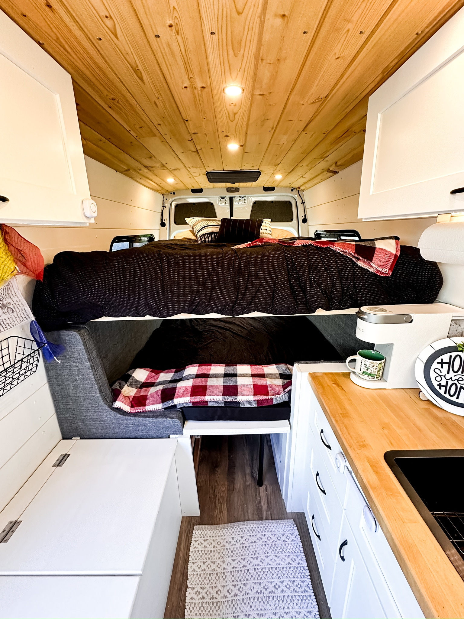 Equipped with an electric bed that raises and lowers to allow for 2 full queen beds for sleeping up to 4. The bed raises into the ceiling when not in use to allow for a dining area when the beds are not in use. Mercedes-Benz Sprinter 2020