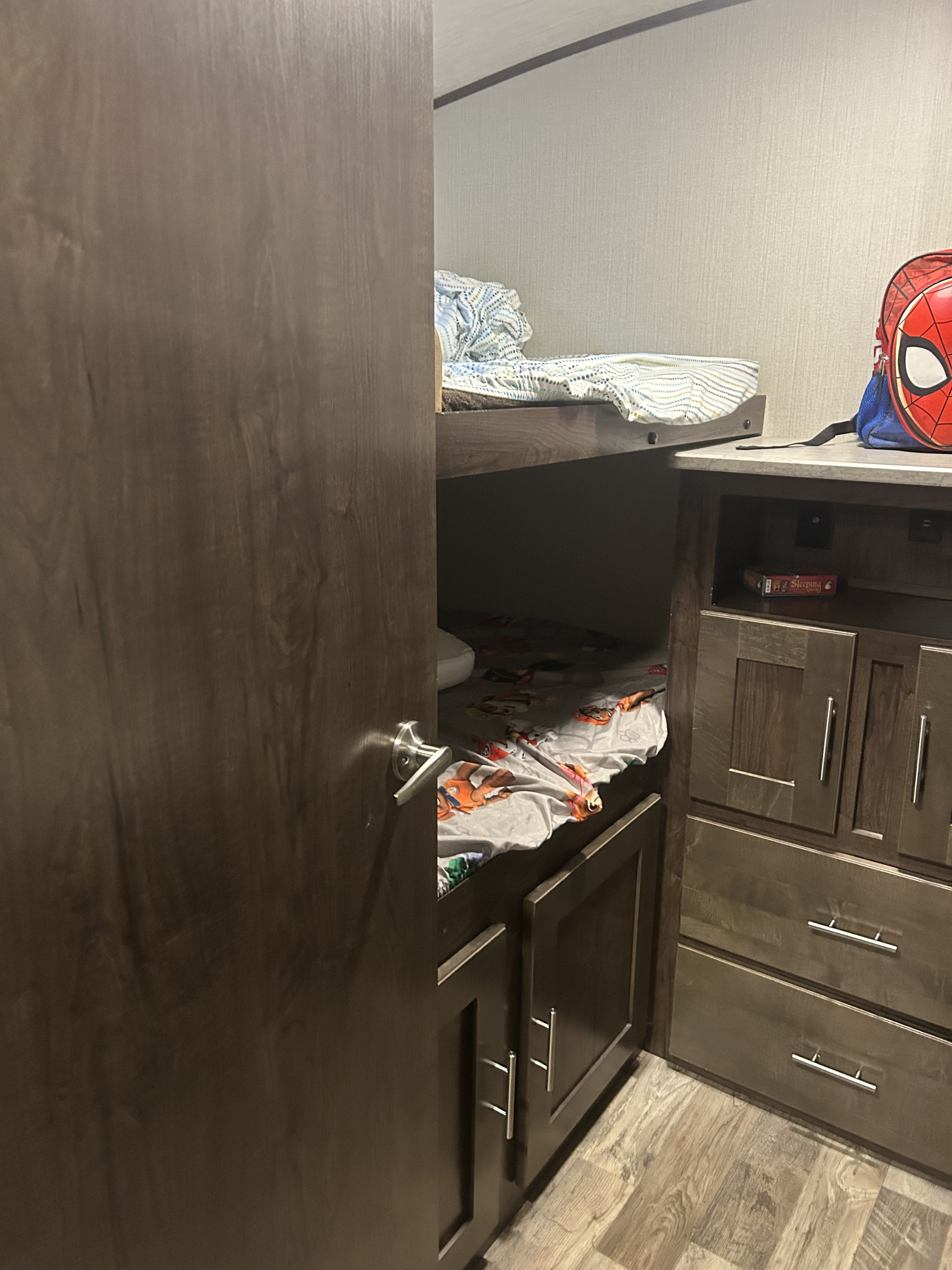 Experience family travel with this RV rental's cozy bunk beds (Paw Patrol bedding) and convenient storage. Spiderman backpack ready!. Cruiser RV Embrace Ultra Lite 2019