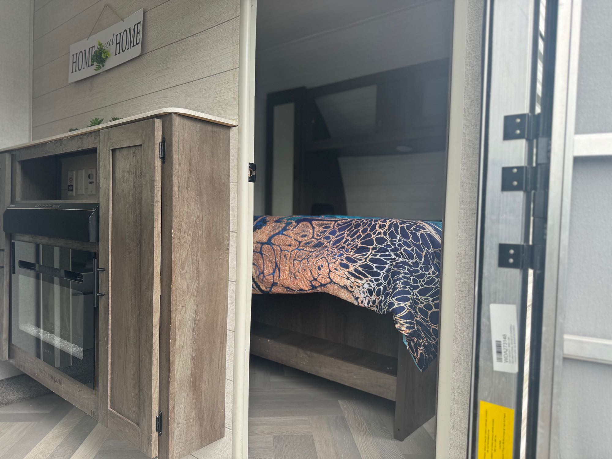 This room includes one bed and storage above bed, sides of bed and underneath the bed.. Forest River Wildwood 2021