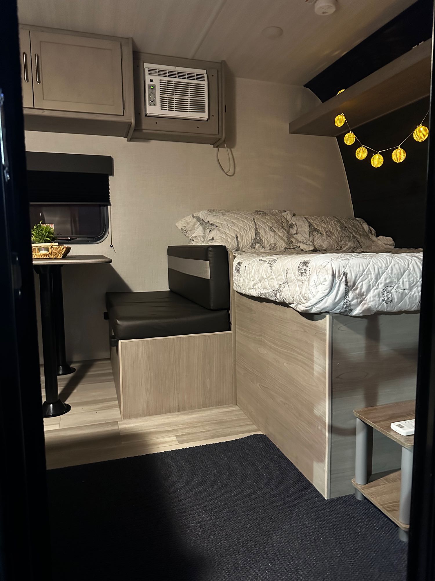 Step inside this cozy RV rental: a comfortable bed, dinette, AC, and storage cabinets. Perfect for your next travel adventure.. Keystone Springdale 2024
