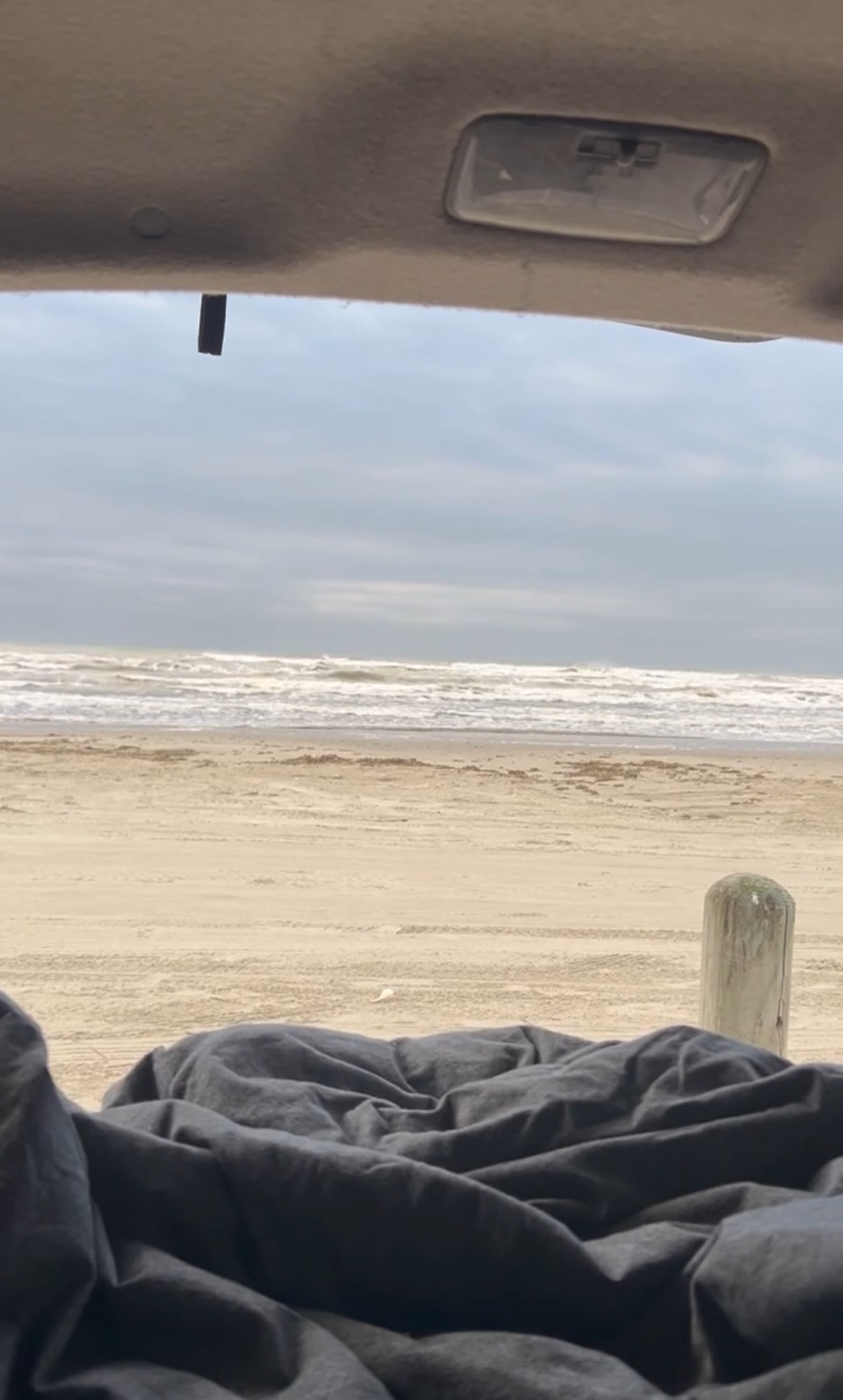 Experience tranquil beach mornings! This cozy rv rental offers an ocean view from inside your camper. Perfect for a coastal trip.. Toyota Landcruiser 2012