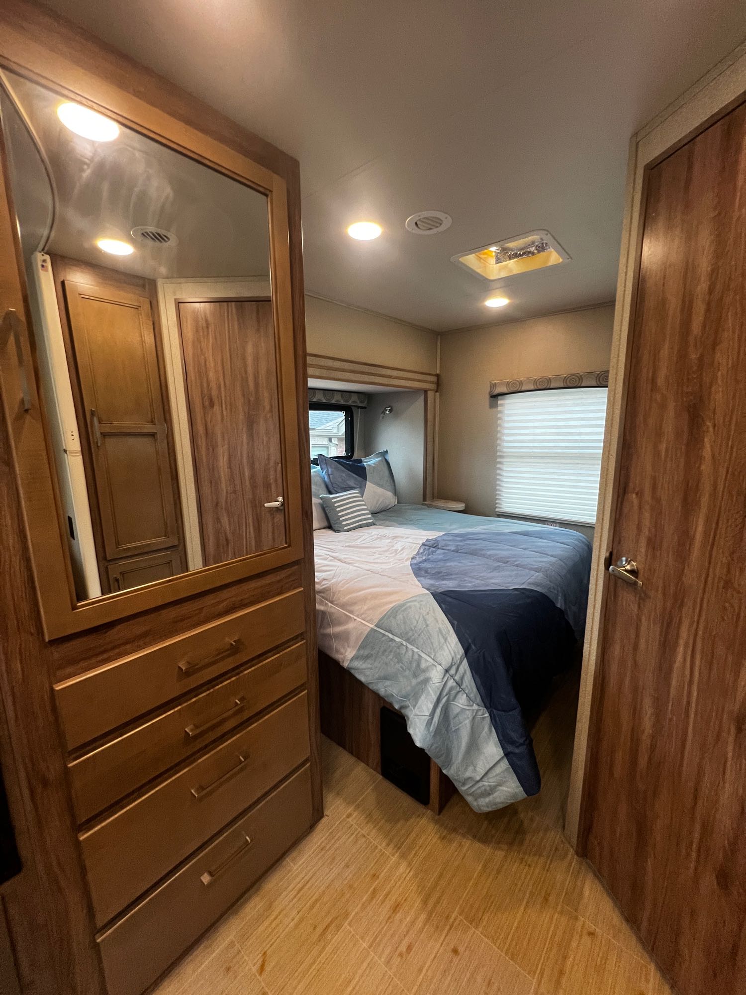 Bedroom does have a privacy curtain that blocks off the bathroom and the wardrobe closet. This gives you plenty of room to change clothes. . Entegra Coach Odyssey 2020