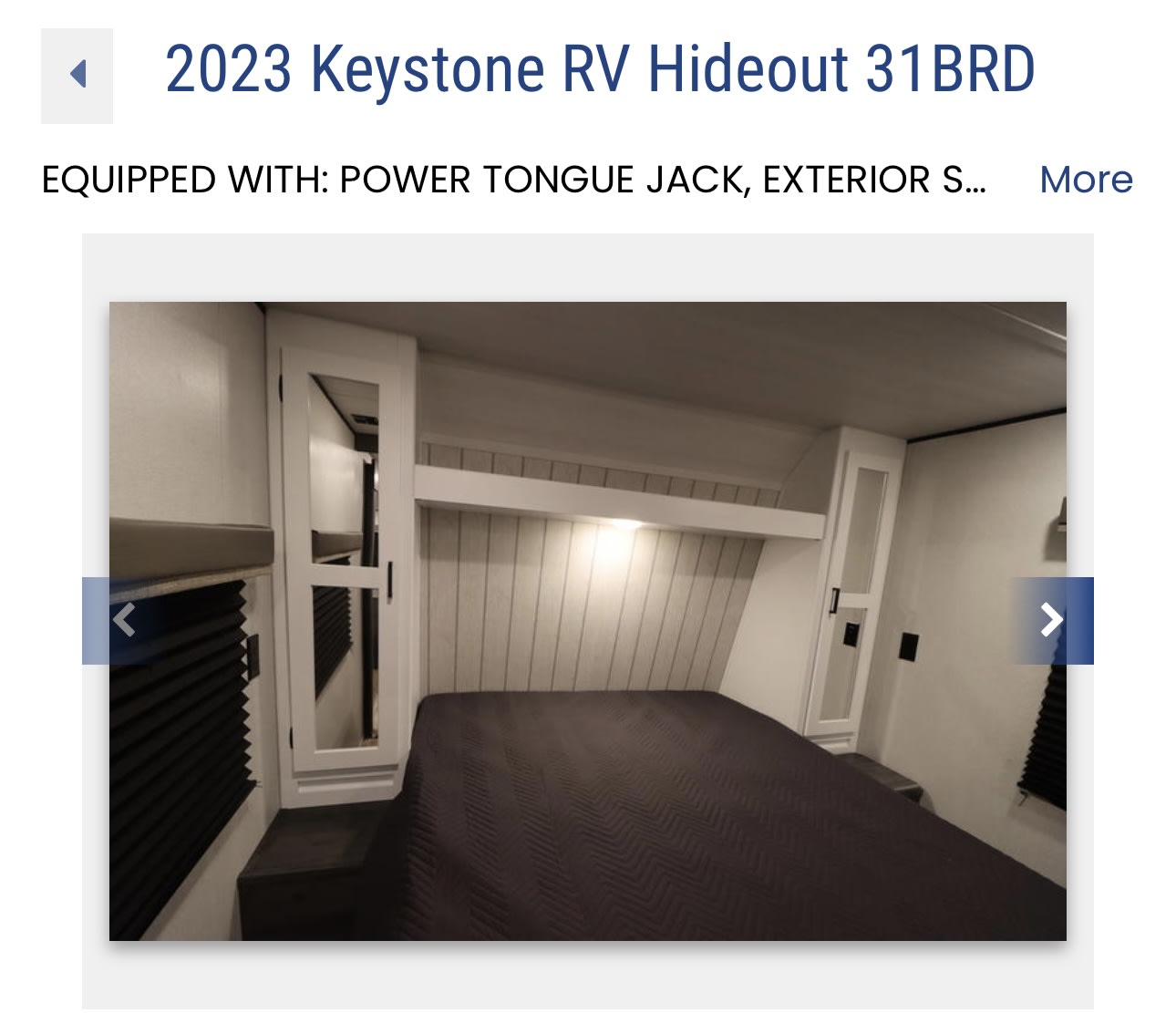 Interior of a 2023 Keystone RV Hideout bedroom, showing the bed, built-in cabinets & window. Perfect for your rv rental.. Keystone RV Hideout 2023