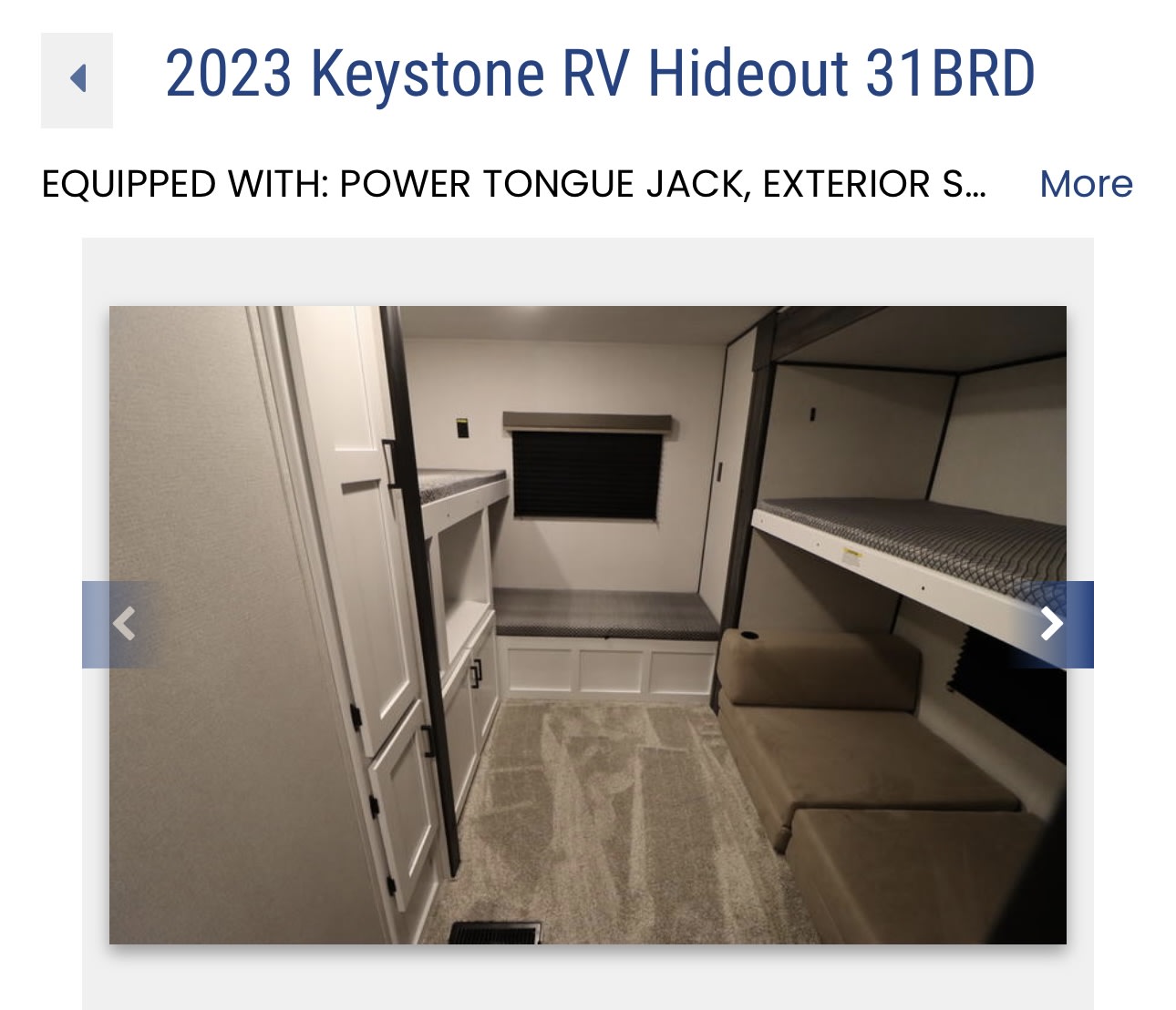 Inside a 2023 Keystone Hideout 31BRD RV rental, featuring bunk beds, seating, and storage for a cozy stay.. Keystone RV Hideout 2023