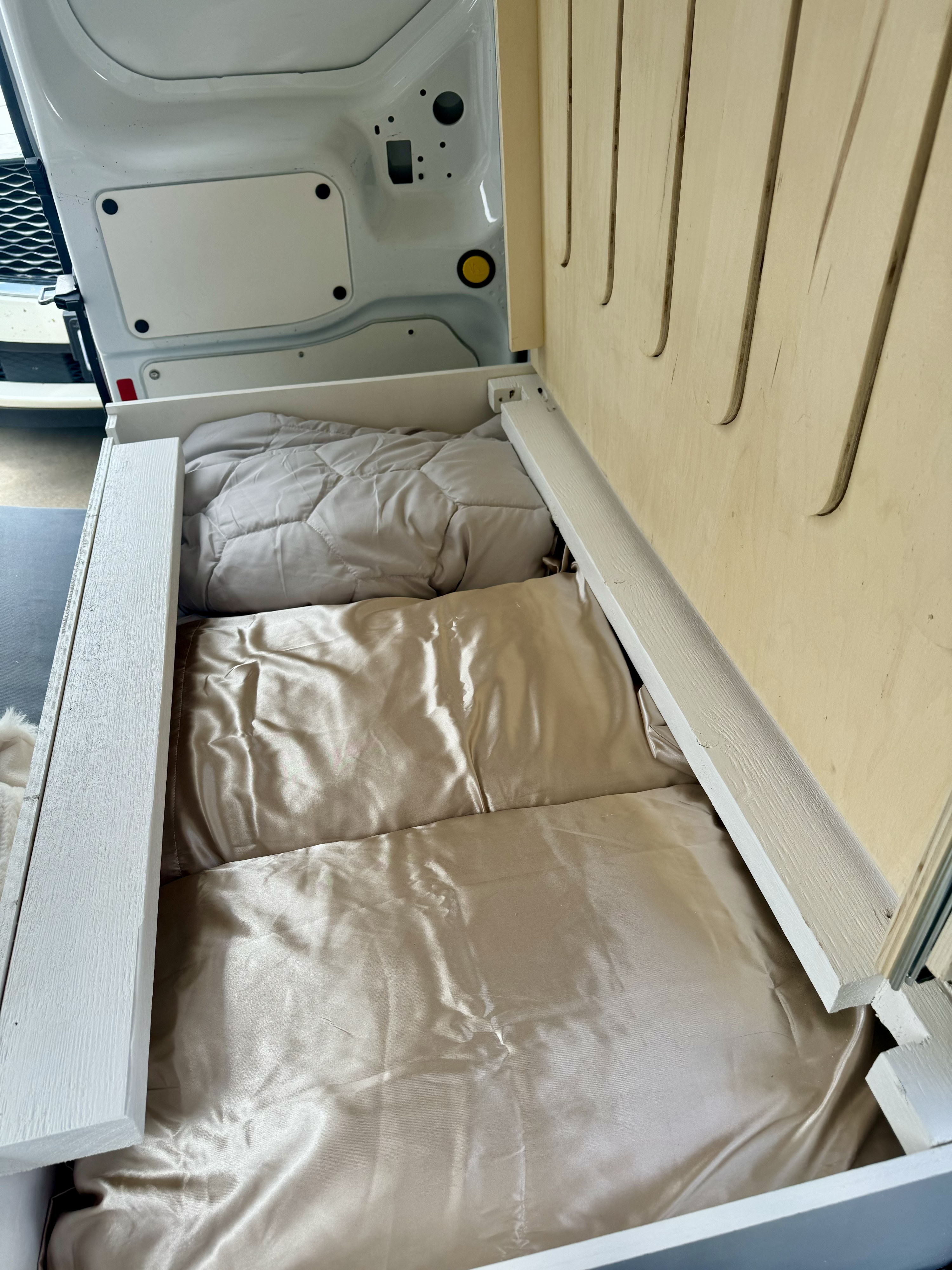 Silk pillows, comforter, and a bed sheet provided. . Ford Transit 2015