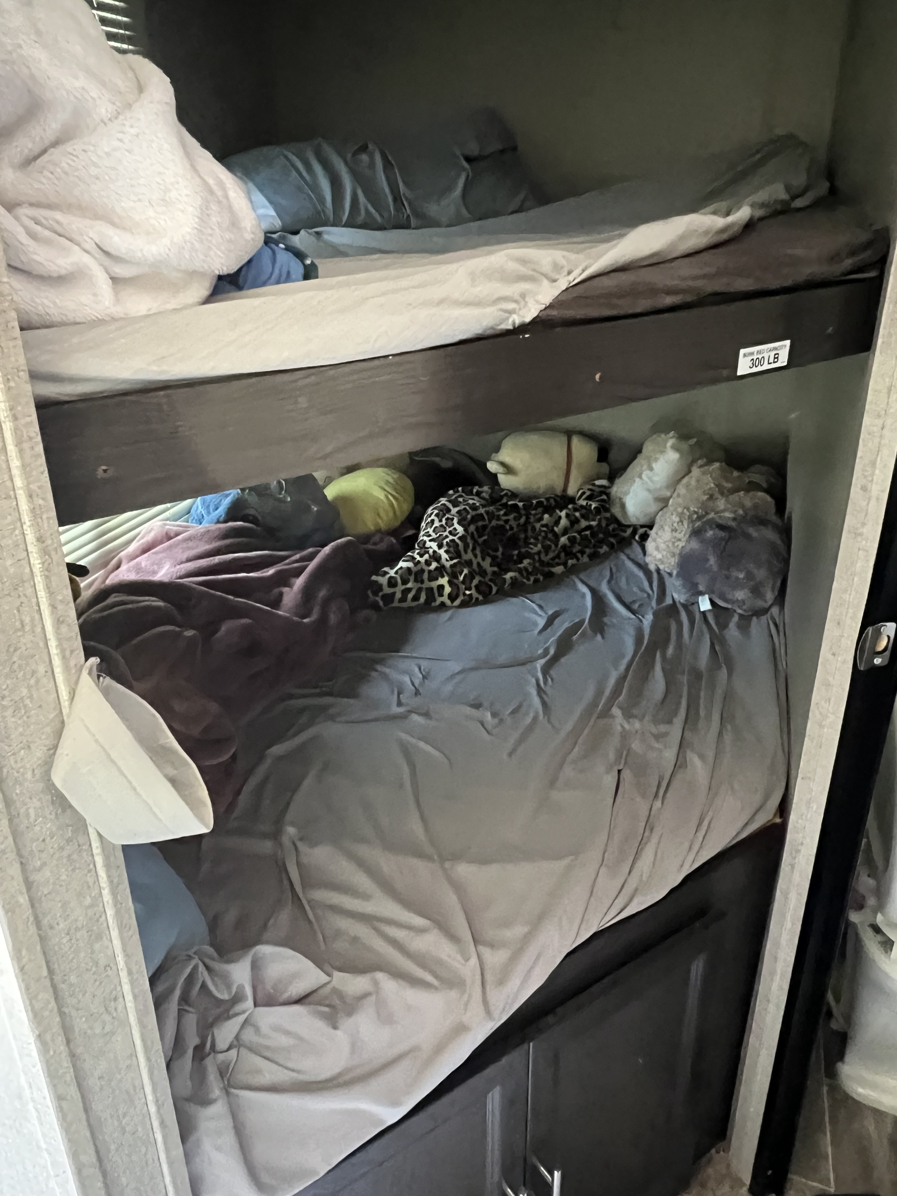 Full size bunk beds, easily fits 1 adult on each bed.  Had USB hookups for charging or watching iPhone or iPad.. Dutchmen Kodiak Ultra Lite 2020