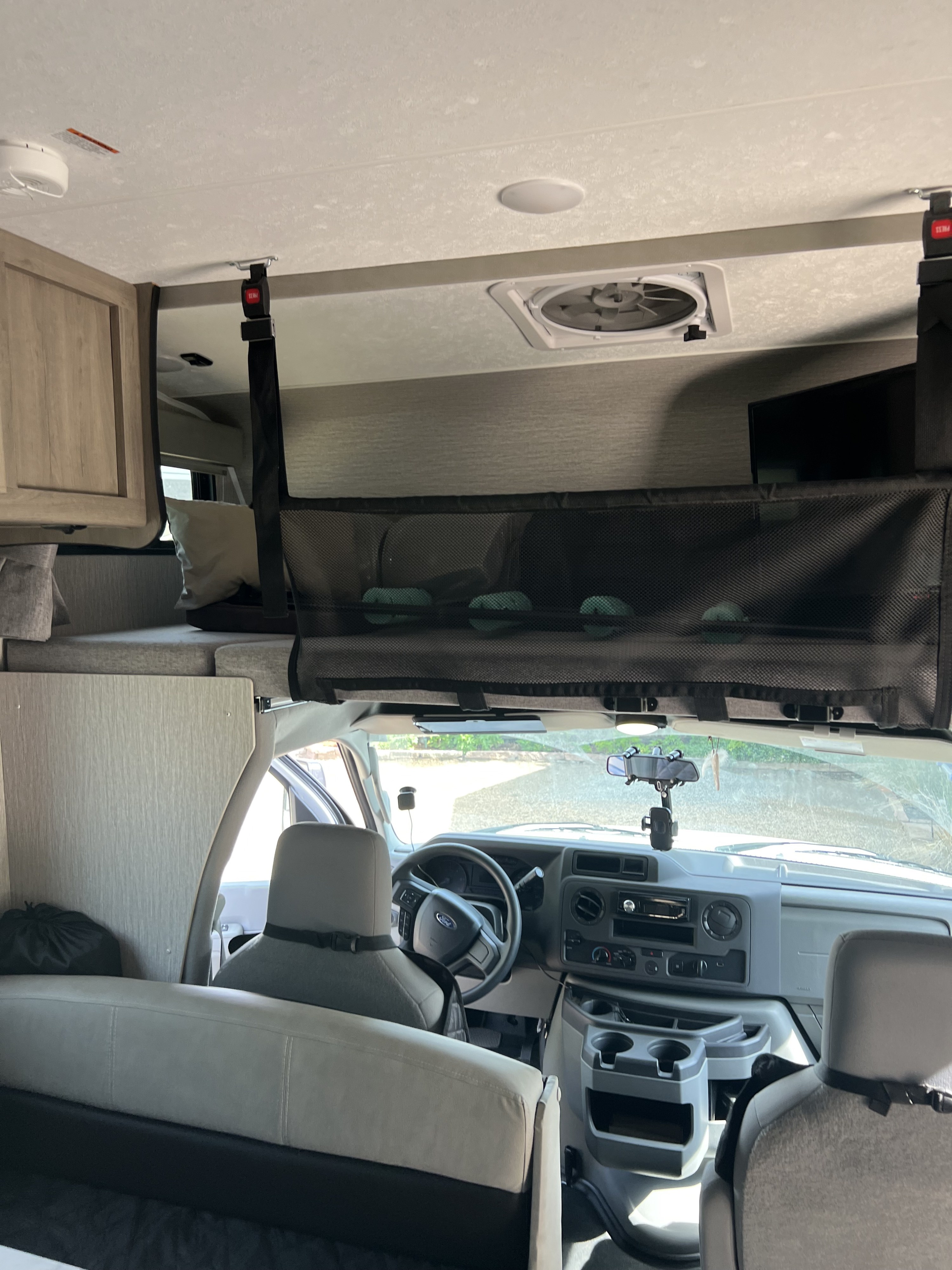 Overhead bunk bed, full size.  . Coachmen Crosstrail 23 XG 2022