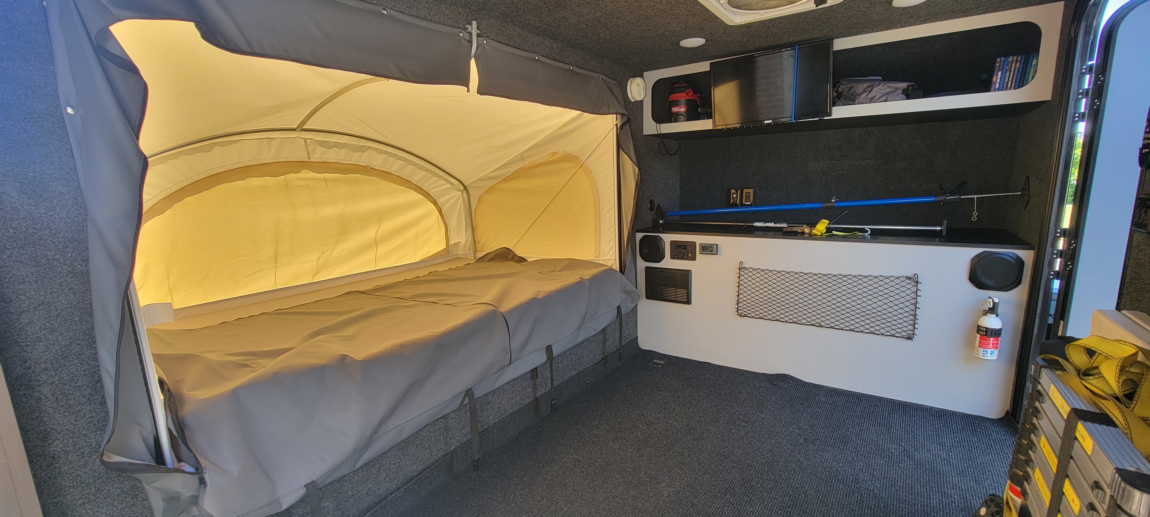 rv rental: well-equipped interior with a pop-up bed, media, storage, and safety features for comfortable travel.. InTech RV InTech RV Trailer 2020