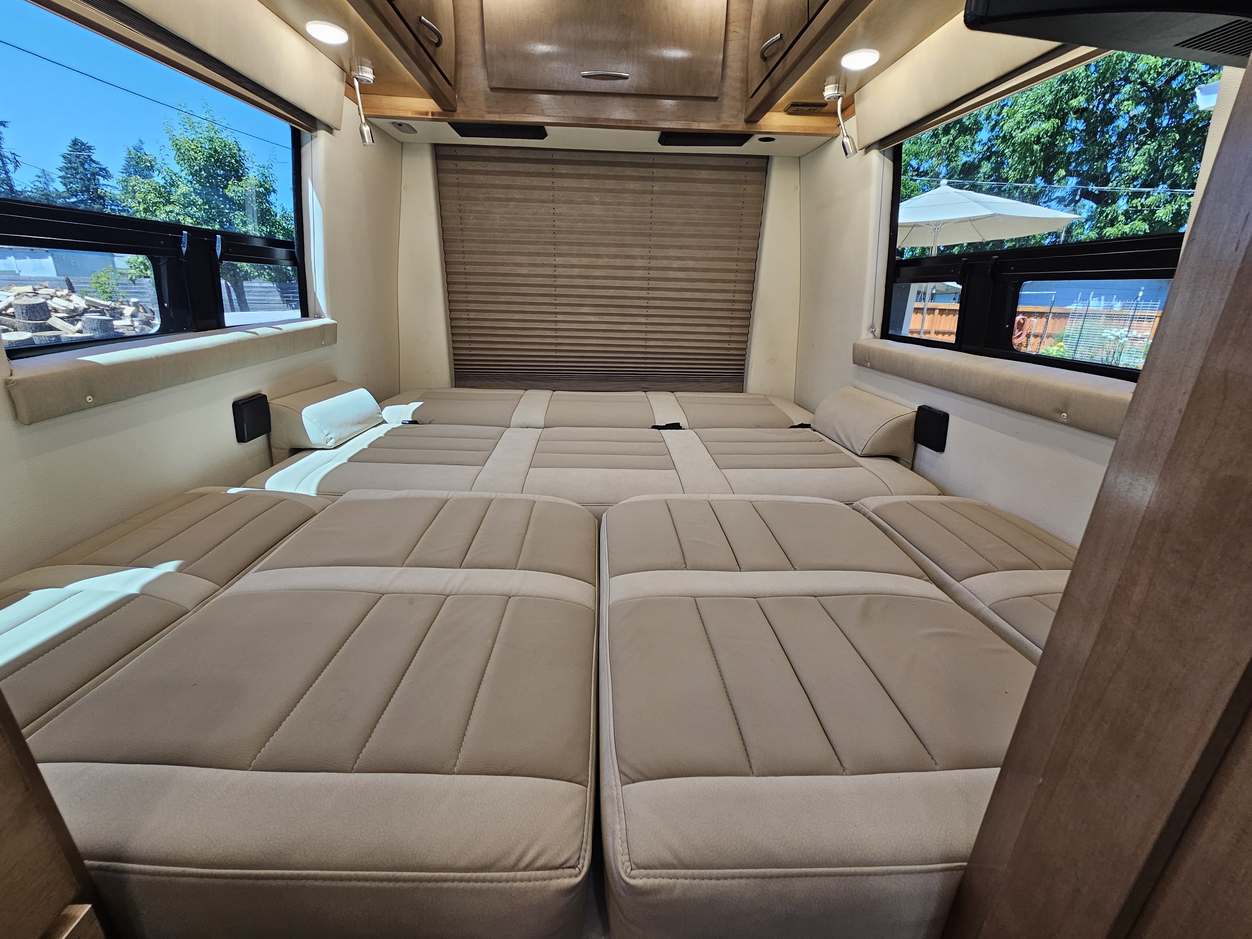 RV rental: Plush cushions form a large, comfortable bed in this camper's rear. Bright windows on each side.. Coachman Galleria 24FL 2021