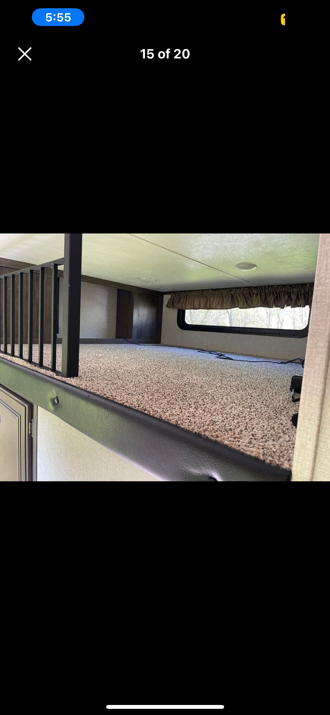 Spacious RV rental loft/bunk area with cozy carpet, window, and safety railing. Ideal for extra sleeping.. Keystone RV Montana High Country 2018
