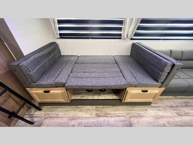 RV rental with versatile convertible sofa/dinette & storage drawers. Perfect for relaxing or sleeping.. Forest River Cherokee Grey Wolf 2024