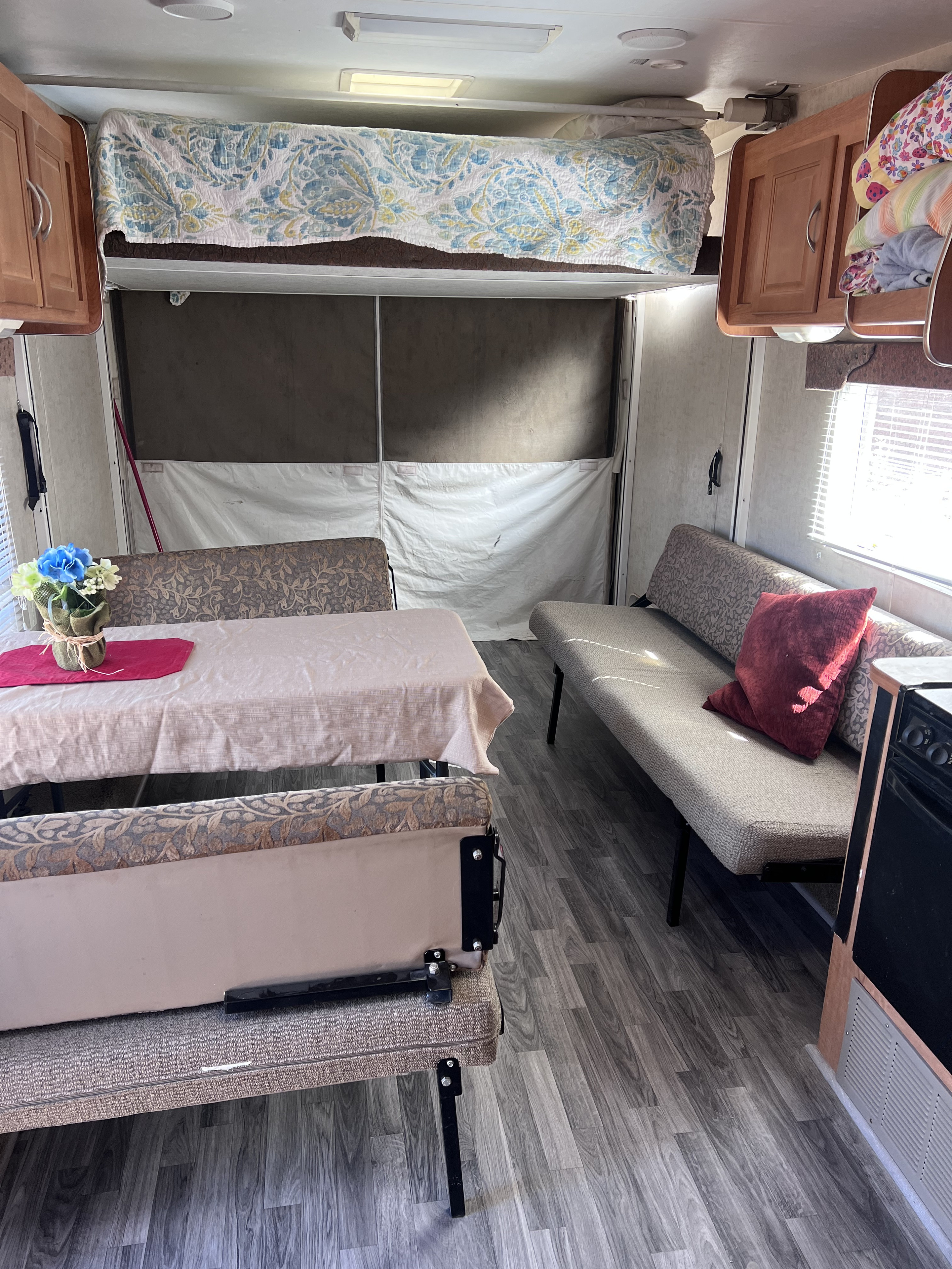 King bed can be raised to accommodate 4- wheeler or motorcycles. Thor Motor Coach Vortex 2005