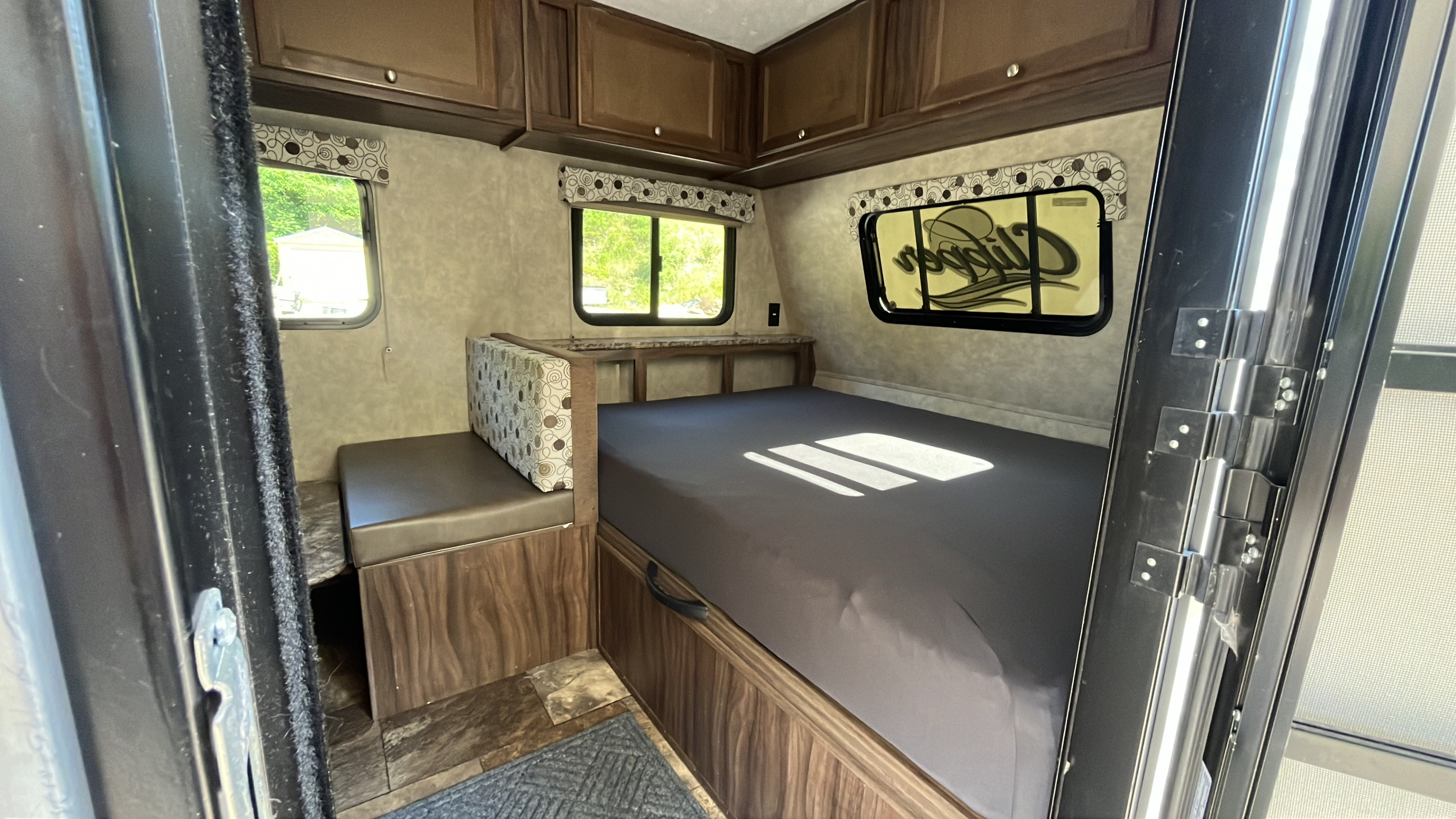 This RV rental offers a compact, functional interior with a comfortable bed, bench seating, and storage cabinets.. Clipper Clipper Trailer 2016