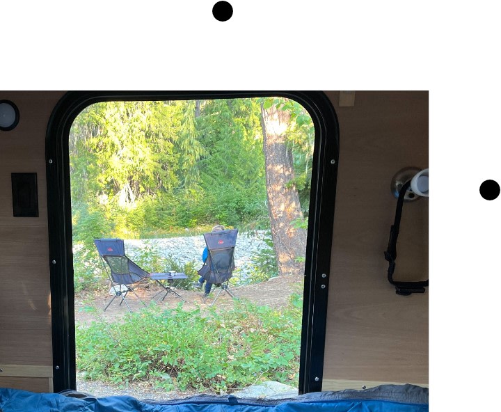 Enjoying the riverside view from our RV rental! Camping chairs are set up for a relaxing day in nature.. Colorado Colorado Teardrop Mount Massive 2022