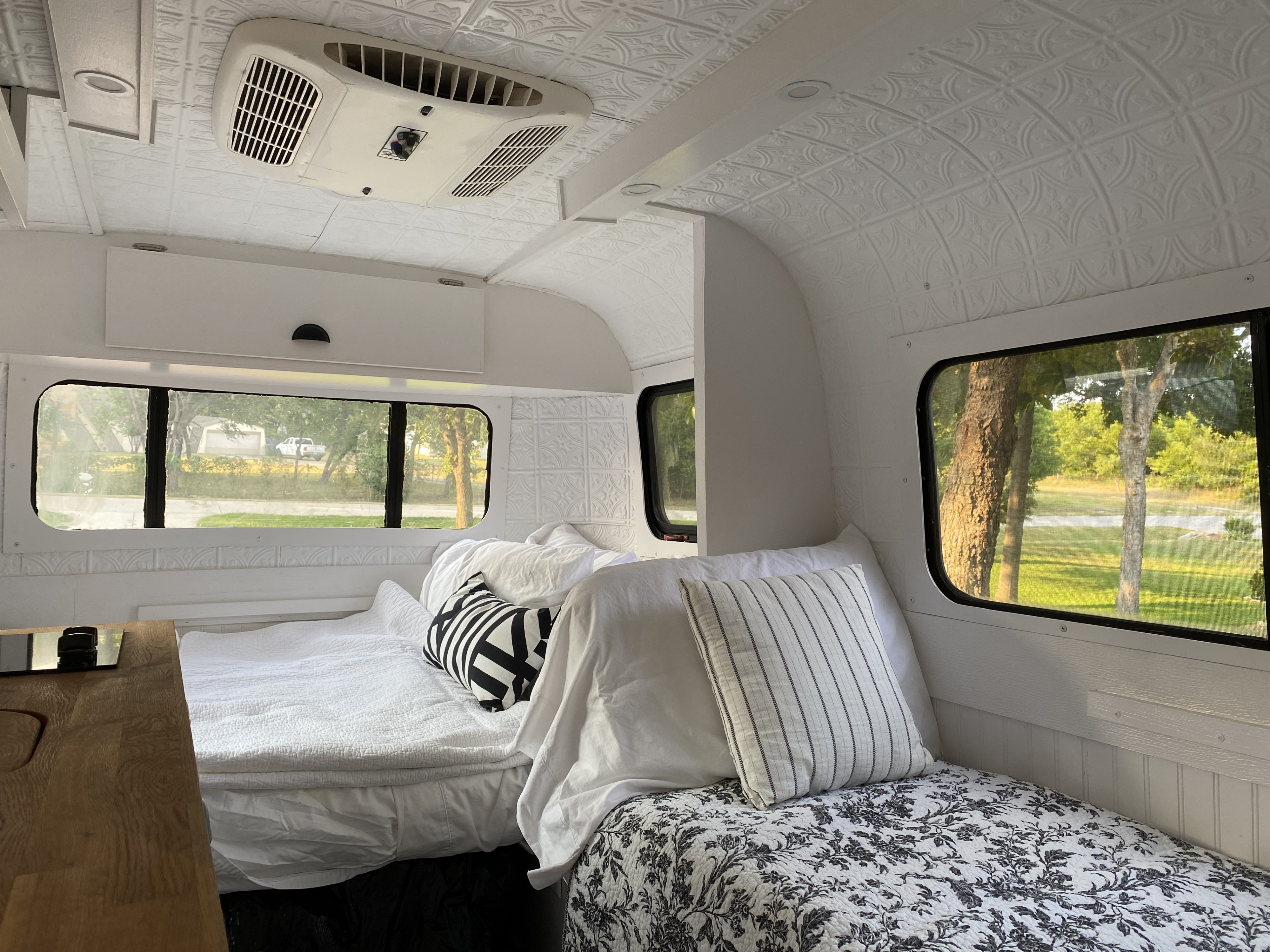 Casita has 2 different dinette conversions for sleeping. A larger area in the back is similar to a full size bed and smaller area on the side is similar to a twin size bed. The large bed comes with mattress topper and down comforter for a super comfortable sleeping experience.. Casita 16 1993