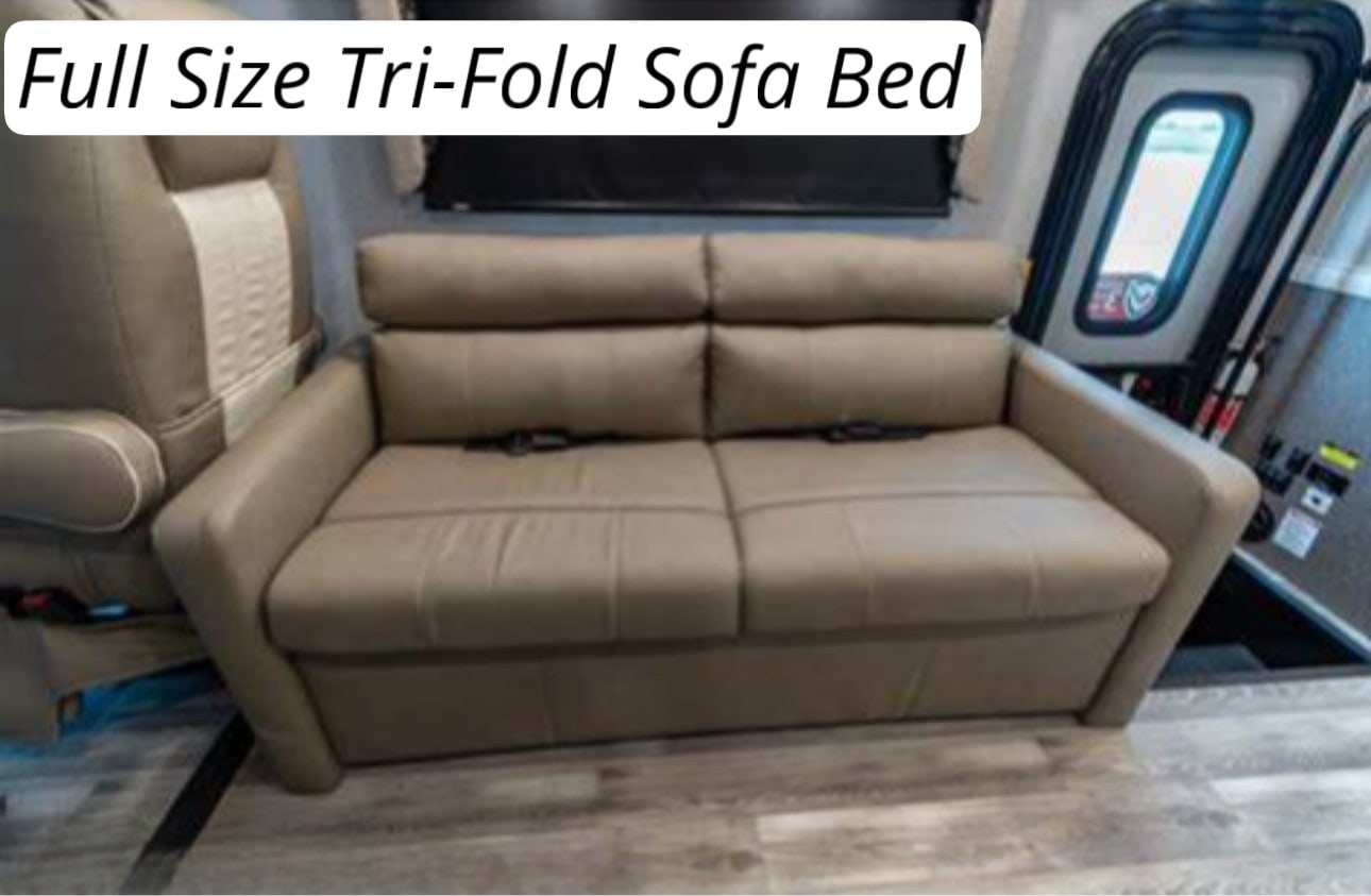 A light tan, full-size tri-fold sofa bed providing flexible sleeping in this RV rental.. Flair-Fleetwood Flair-Fleetwood Motorhome 2022