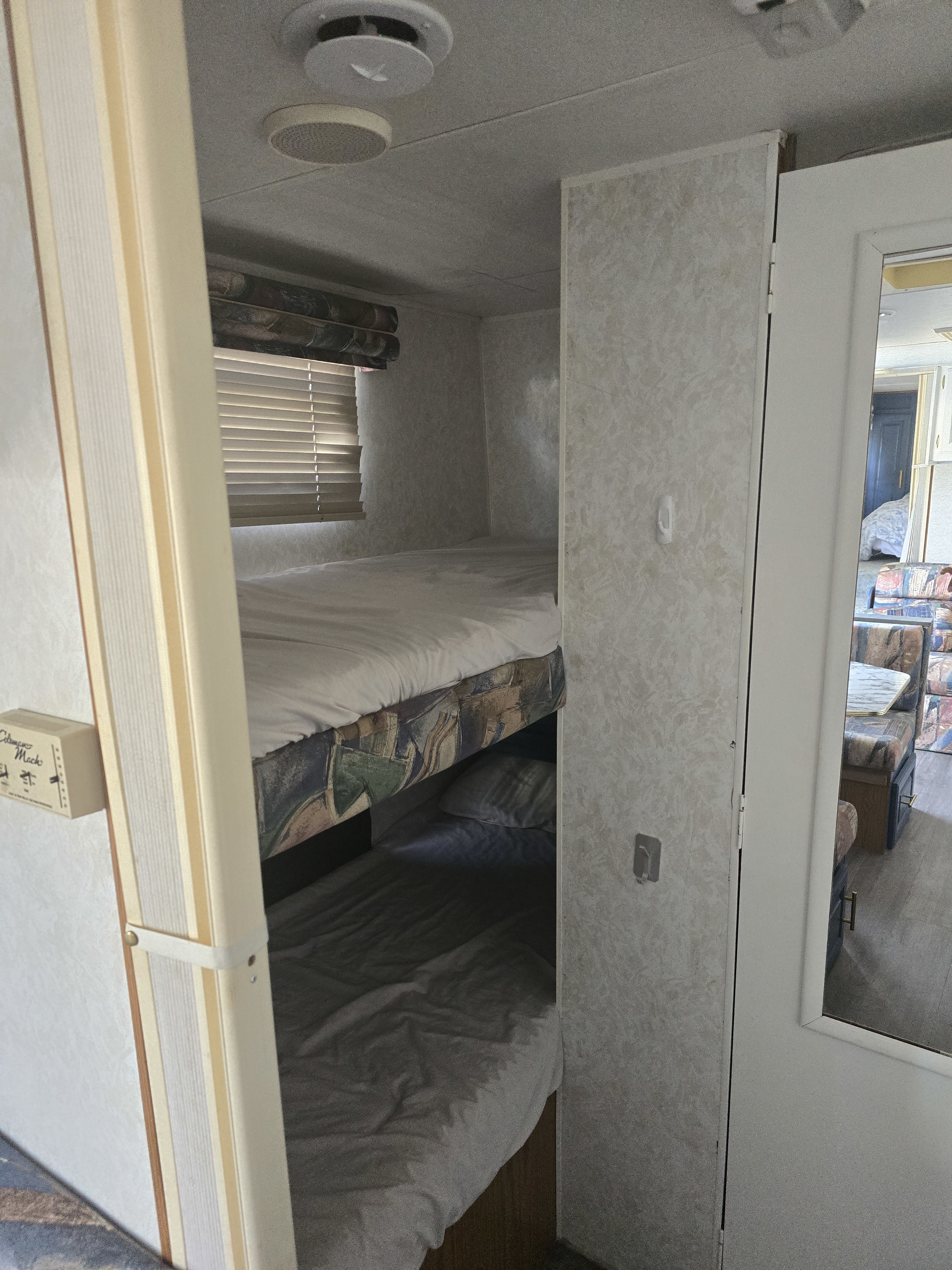 Bunk beds.  Top bed is 200lb capacity . Jayco Eagle 1999