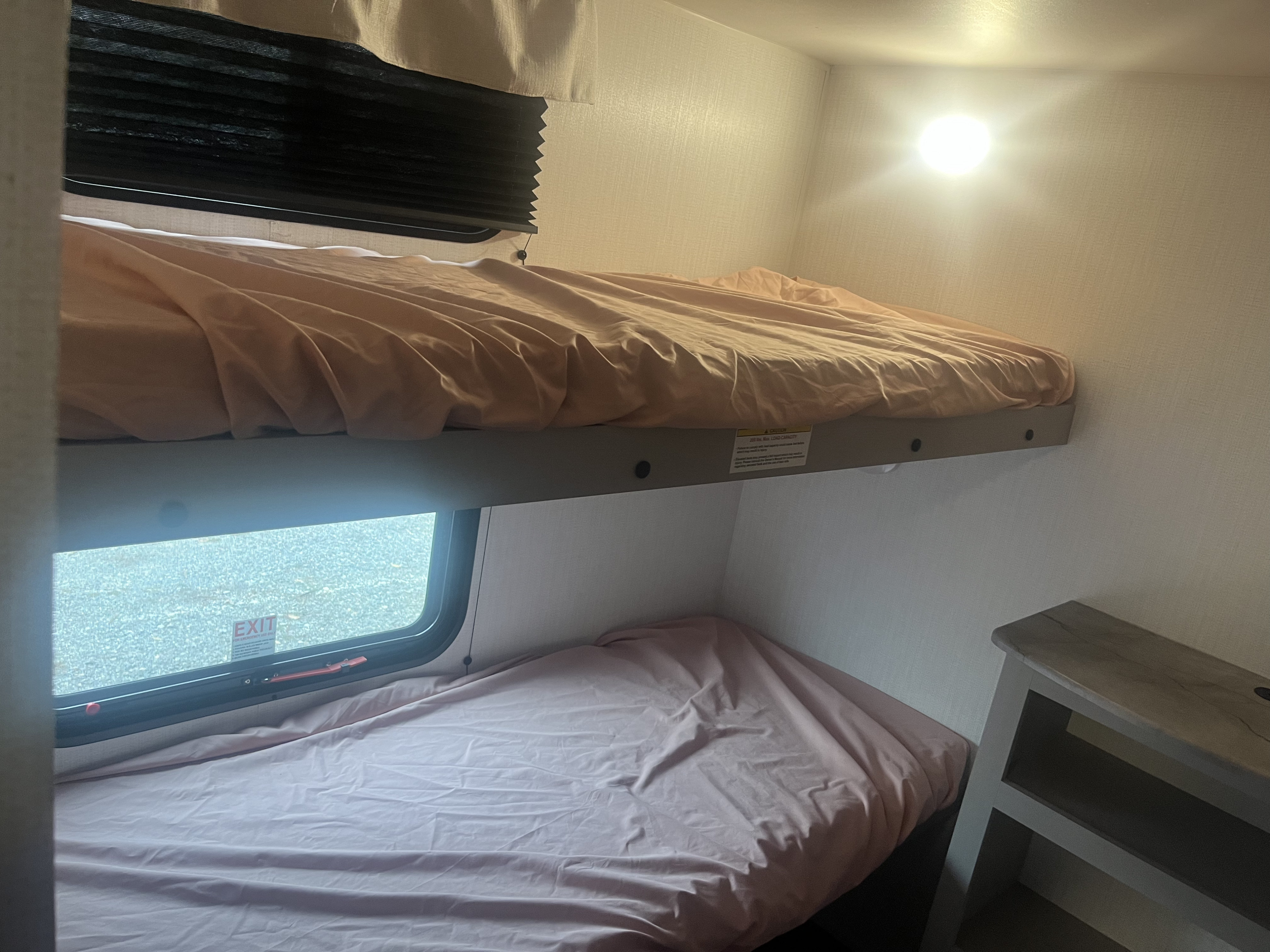 An RV rental bunk bed setup.. Heartland RVs Prowler Lynx 302 BHX 2025
