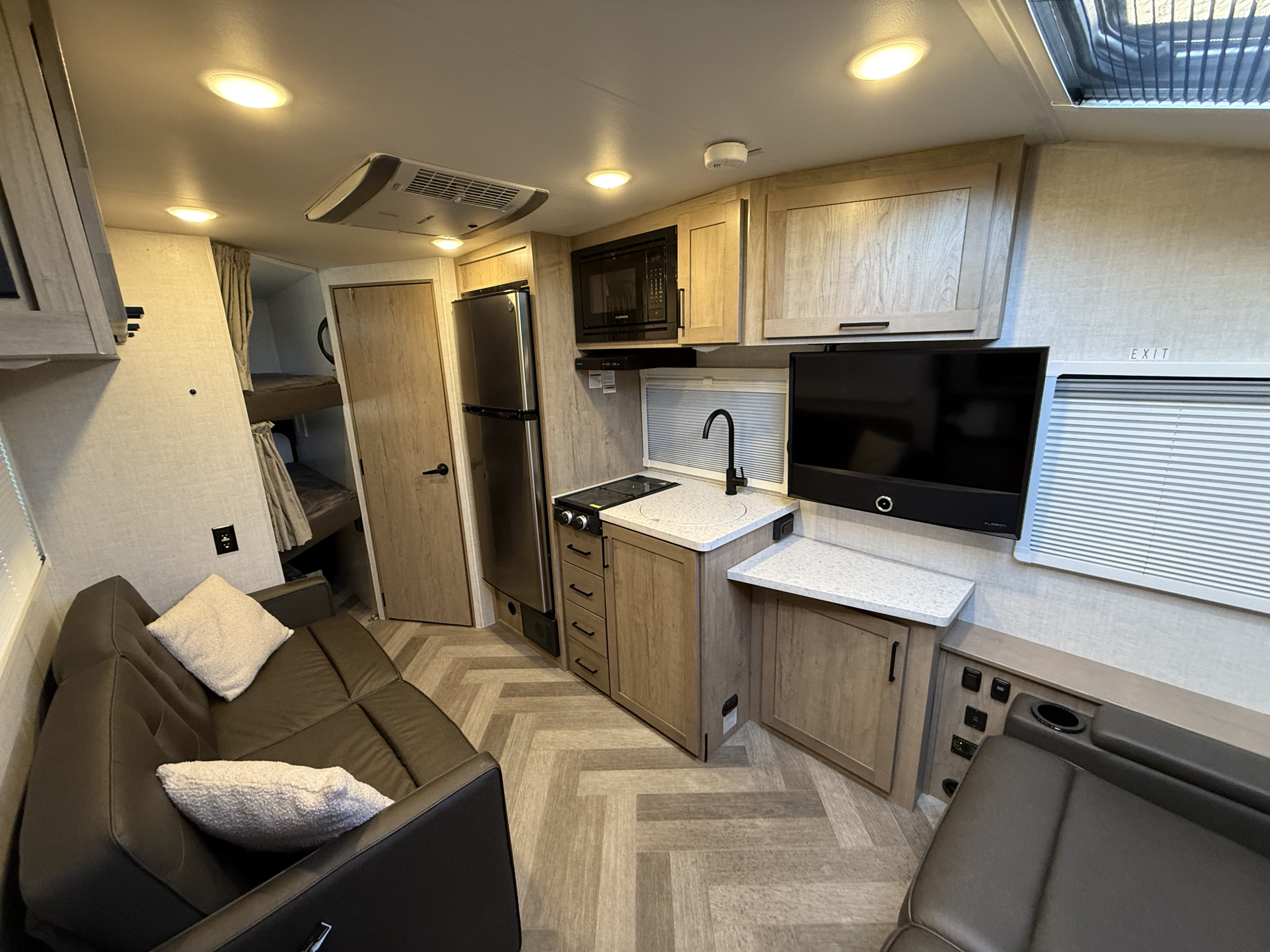 Camper kitchen and lounge viewed from the rear