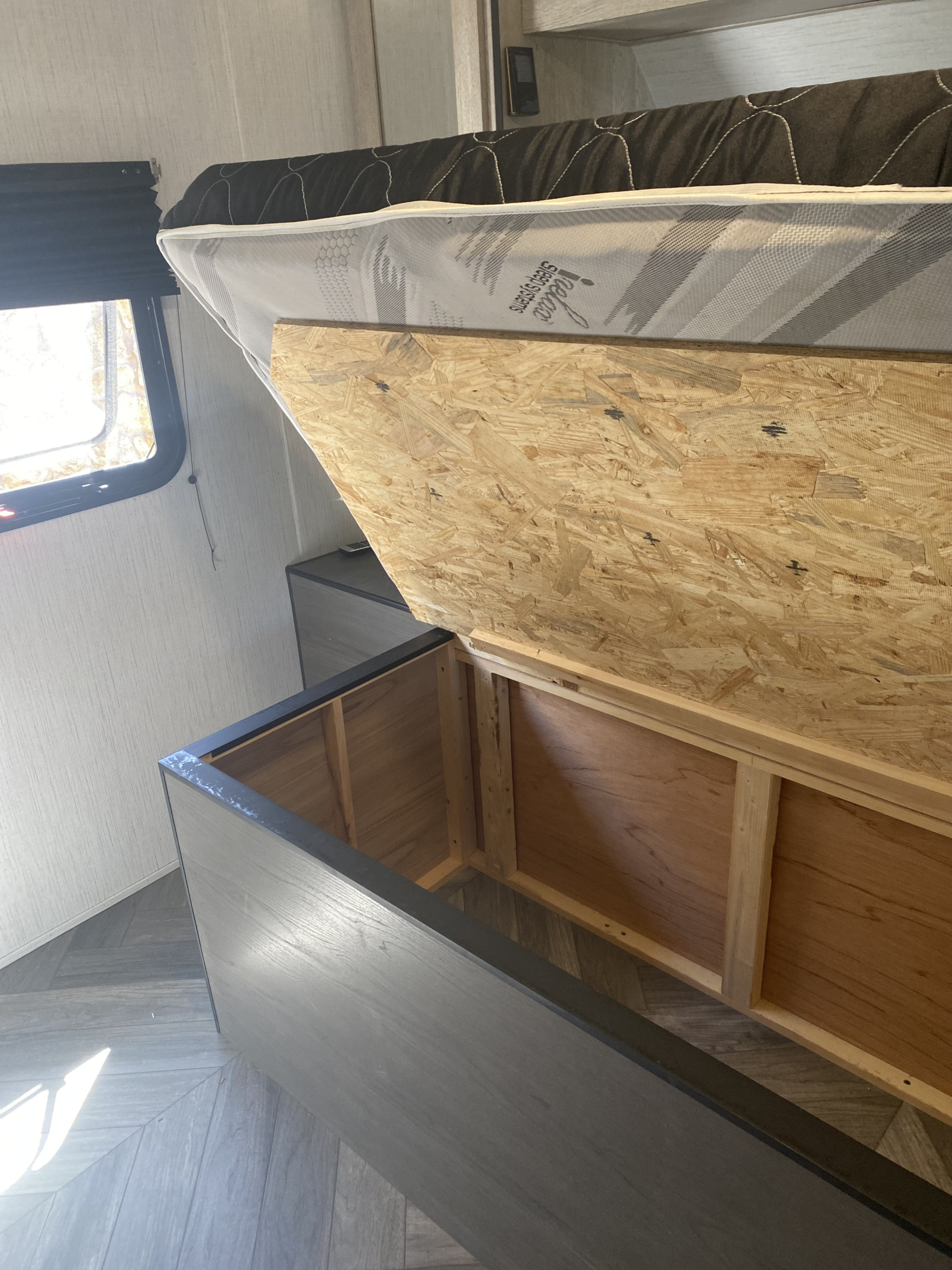 Experience convenience in an rv rental! This bed lifts to reveal ample under-bed storage, perfect for your travels.. Heartland RVs Prowler 2021