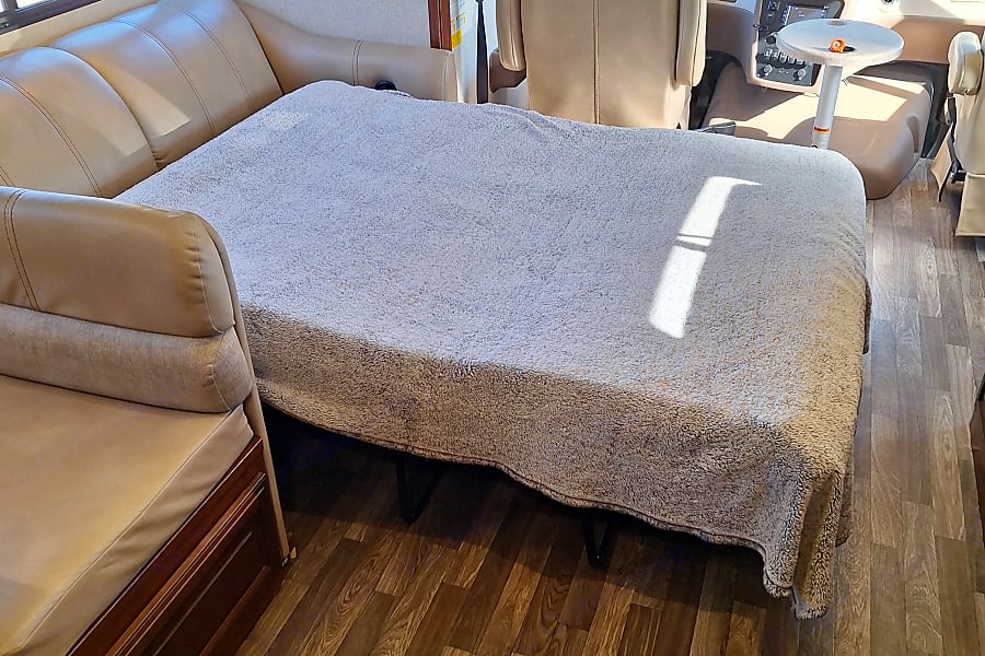 Extended pull-out bed in an RV rental. Ready for sleeping, this comfy RV sofa bed offers extra space.. FR3 FR3 Motorhome 2018