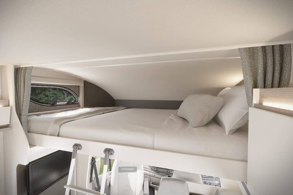 Inside an RV rental, showing the elevated main bed with a window and curtains, designed for restful camper journeys.. Swift Voyager 494 (NO PETS) 2025