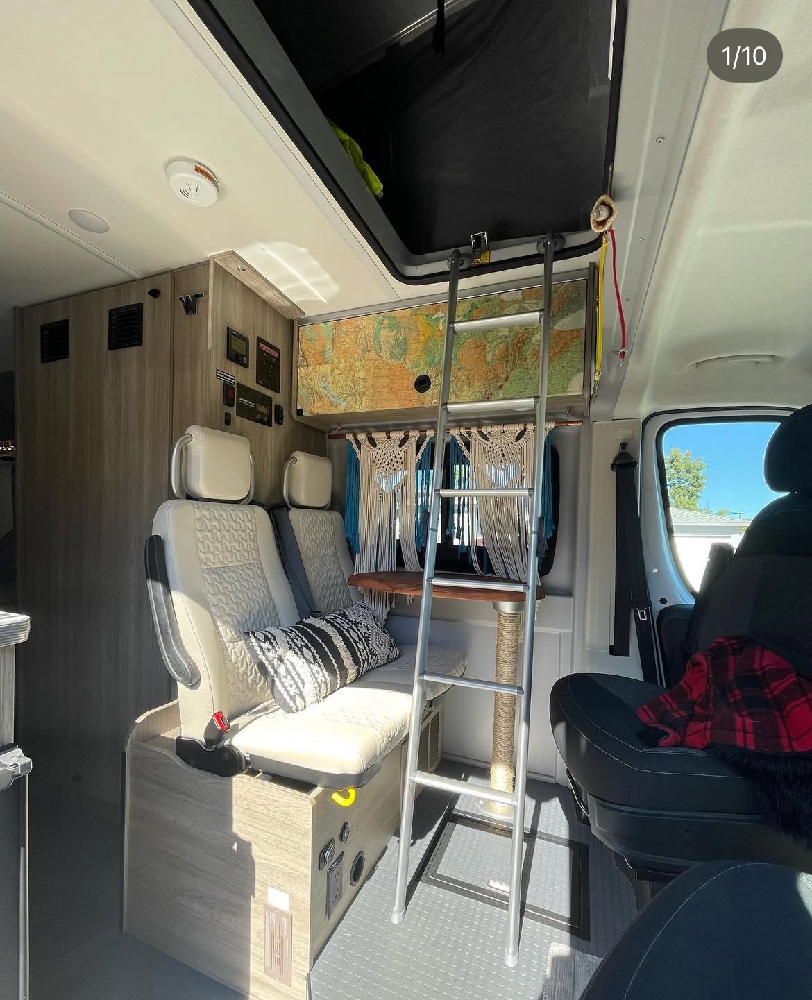 This rv rental offers a comfy interior with light wood, cream seats, a ladder to the bunk, map wall, and even a cat scratcher.. Dodge Winnebago 2021