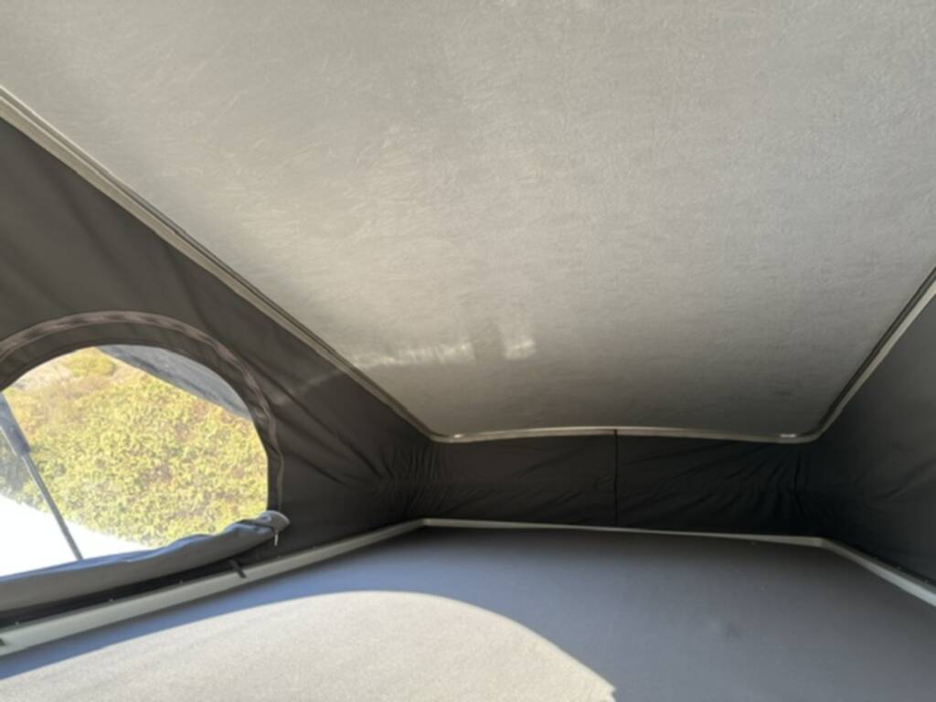 Cozy bed in the pop up!  . Winnebago Solis 59P 2021