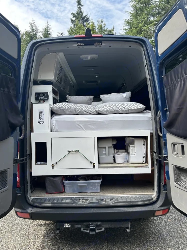 Ready for adventure! This RV rental camper van features a comfortable bed & organized storage. Perfect for travel.. Dodge Sprinter Van 2007