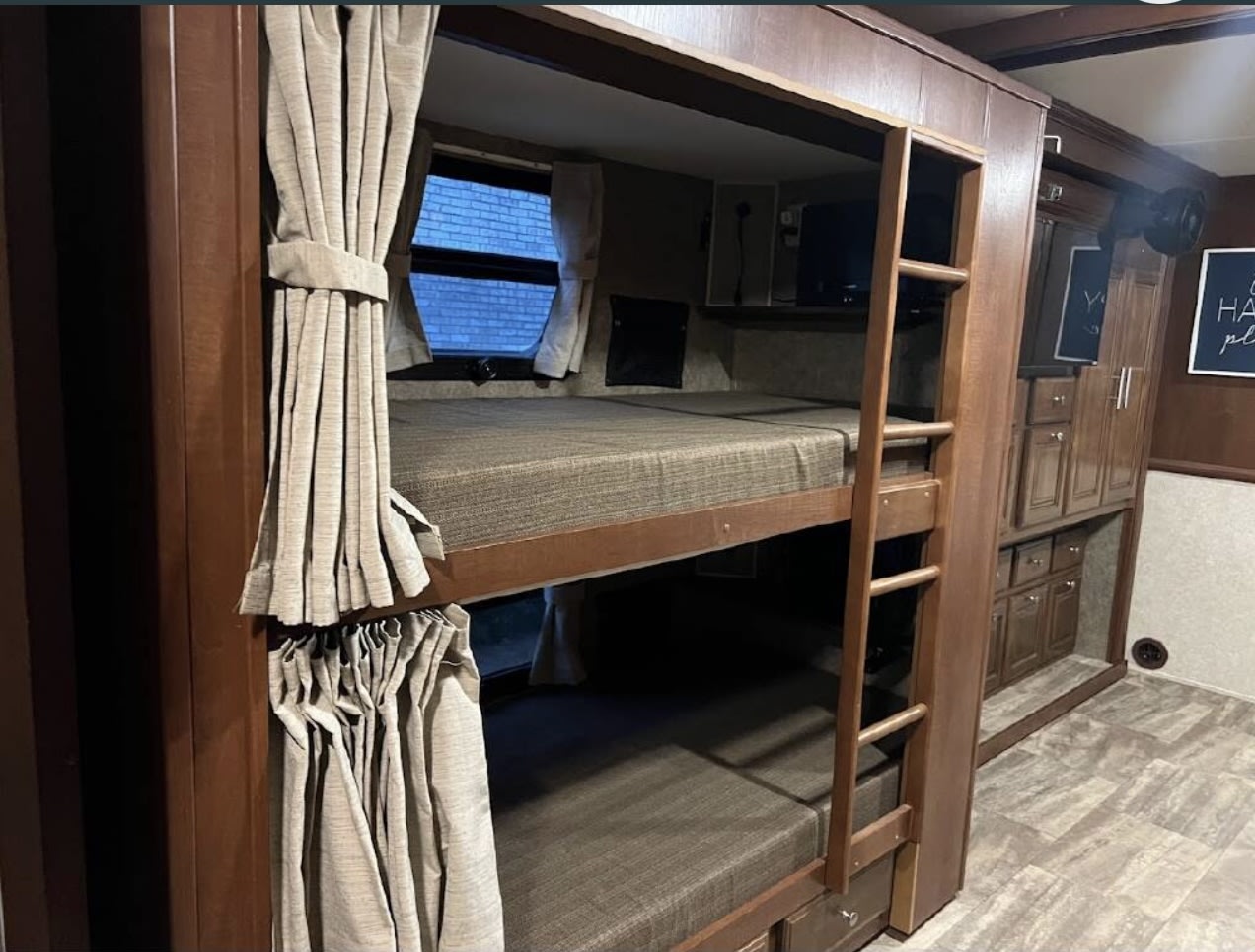 Experience comfort in this RV rental! Features two built-in bunk beds with privacy curtains and ample storage.. Forest River Georgetown 2016