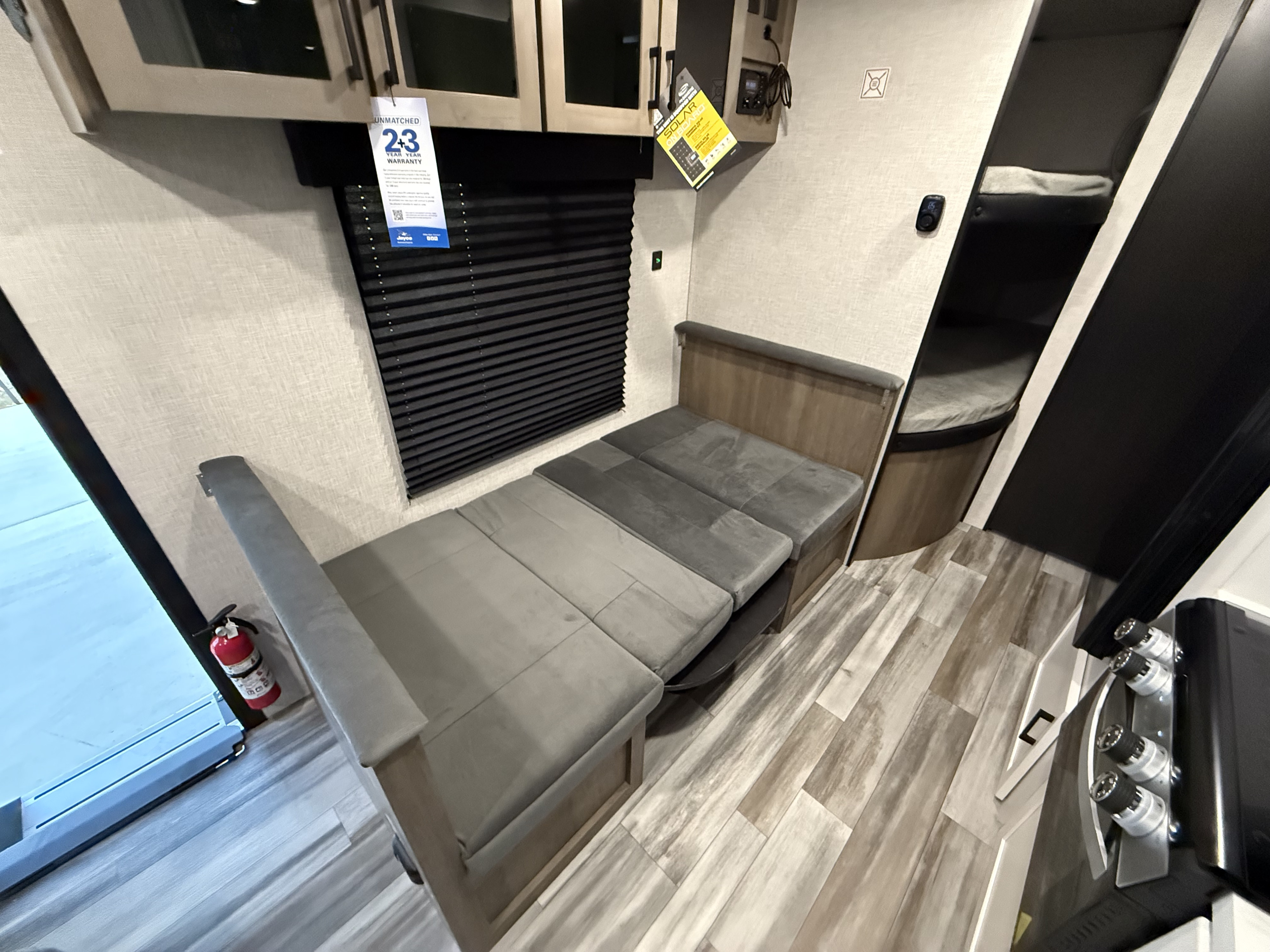 Inside this cozy RV rental, you'll find a convertible dinette bed, bunk beds, and a glimpse of the kitchen.. Jayco Jay Flight STX 260BHW 2025
