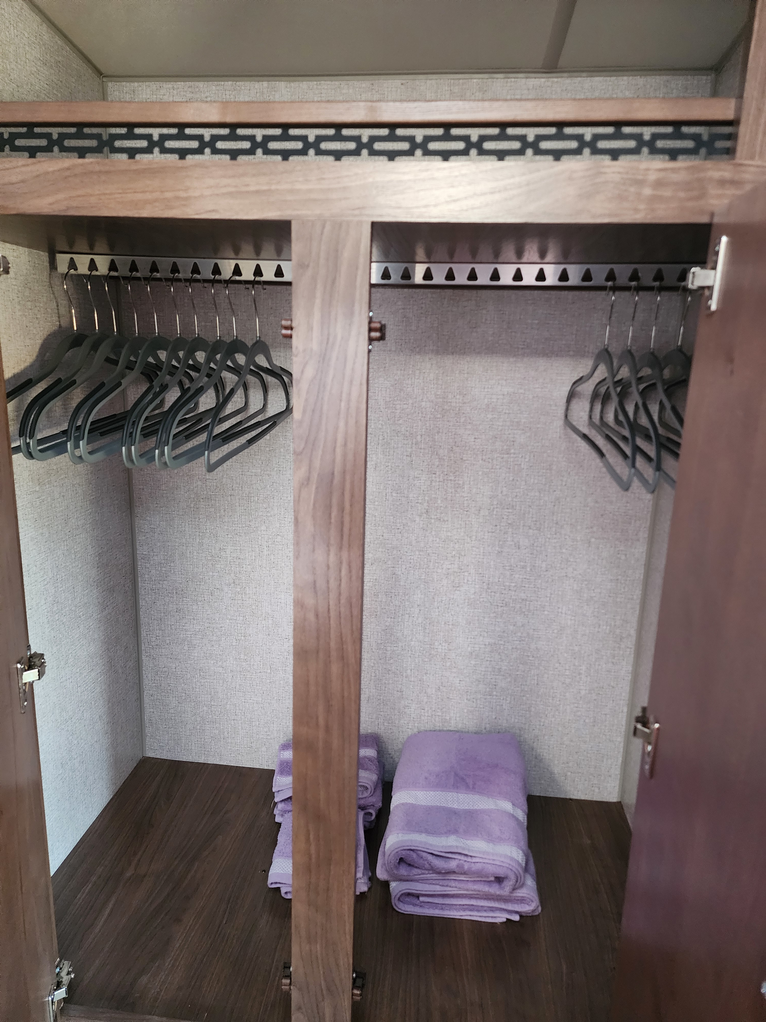 Stay organized in your RV rental! Spacious closet features hangers & folded towels, ready for your travel essentials.. Nash Nash Trailer 2021